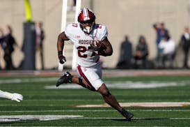 Indiana running back Trent Howland carries the ball during the first half of an NCAA college football game against Illinois Saturday, Nov. 11, 2023, i