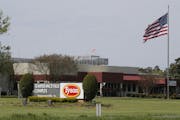 An American flag flies outside the Tyson Foods Inc., Temperanceville Complex, Wednesday April 29, 2020, in Temperanceville, Va. Big meatpacking compan