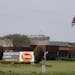 An American flag flies outside the Tyson Foods Inc., Temperanceville Complex, Wednesday April 29, 2020, in Temperanceville, Va. Big meatpacking compan