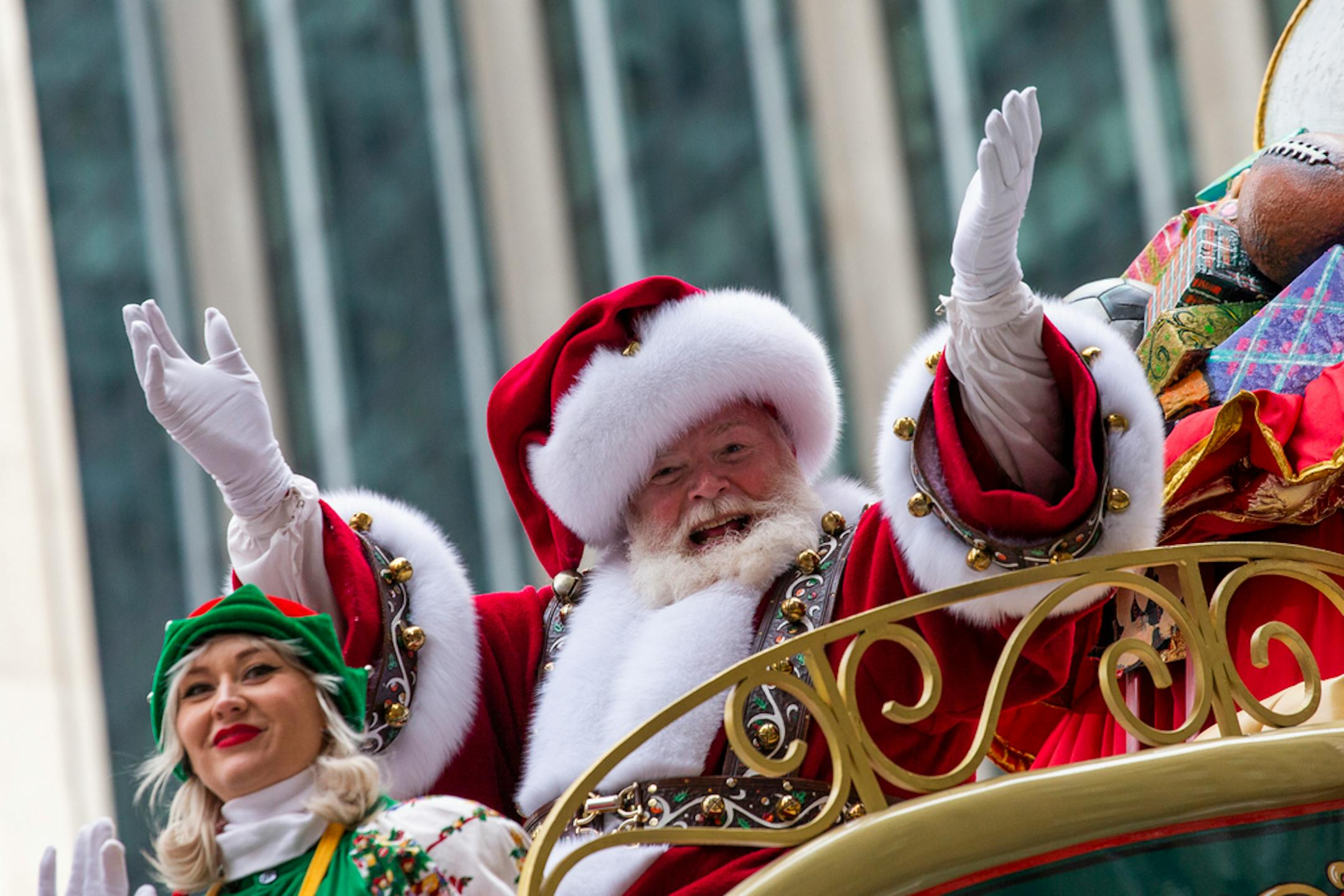 Santa Claus waves during the Macy's Thanksgiving Day Parade, Nov. 28, 2019, in New York. Macy's said Santa Claus won't be greeting kids at its flagship New York store this year due to the coronavirus, interrupting a holiday tradition started nearly 160 years ago. However, Macy's said the jolly old man will still appear at the end of the televised Macy's Thanksgiving Day parade.