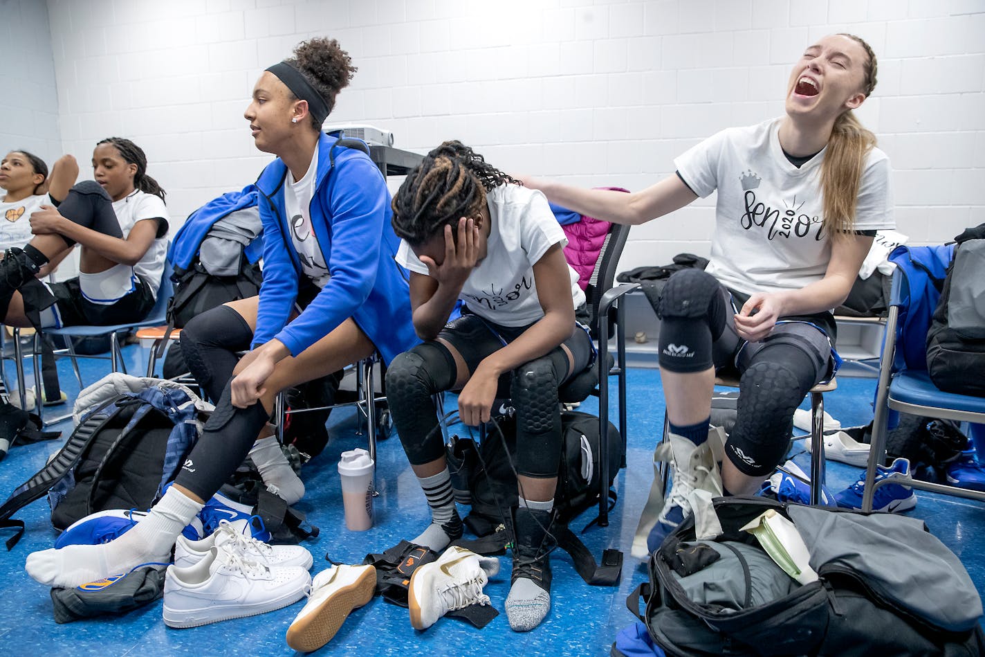 Hopkins' Paige Bueckers joked around with teammates, Maya Nnaji, left, and Kayla Adams during the "Senior Night" game at the Lindbergh Center, Friday, February 21, 2020 in Minnetonka, MN. ] ELIZABETH FLORES • liz.flores@startribune.com