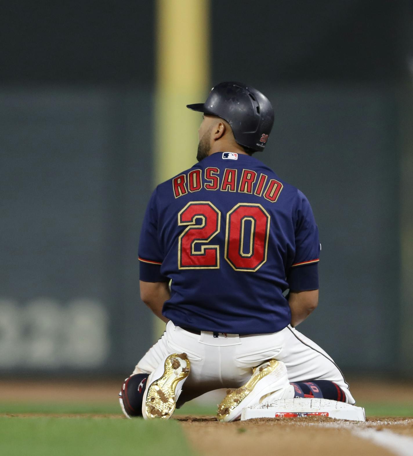 Minnesota Twins right fielder Eddie Rosario (20) stayed on his knees after being thrown out at first base in the fifth inning. ] LEILA NAVIDI &#x2022; Leila.navidi@startribune.com The Minnesota Twins met the New York Yankees in Game 3 of their American League Division Series Monday October 7, 2019 at Target Field. ORG XMIT: MIN1910072210250724