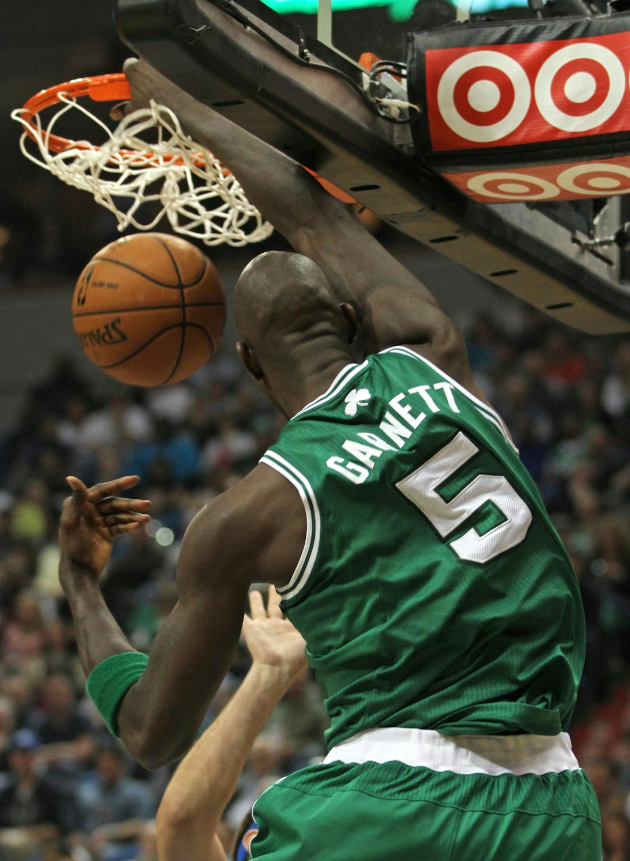 Minnesota Timberwolves vs. Boston Celtics, Target Center, 3/30/12. (left to right) Boston's Kevin Garnett slammed the ball for a 2nd half basket.