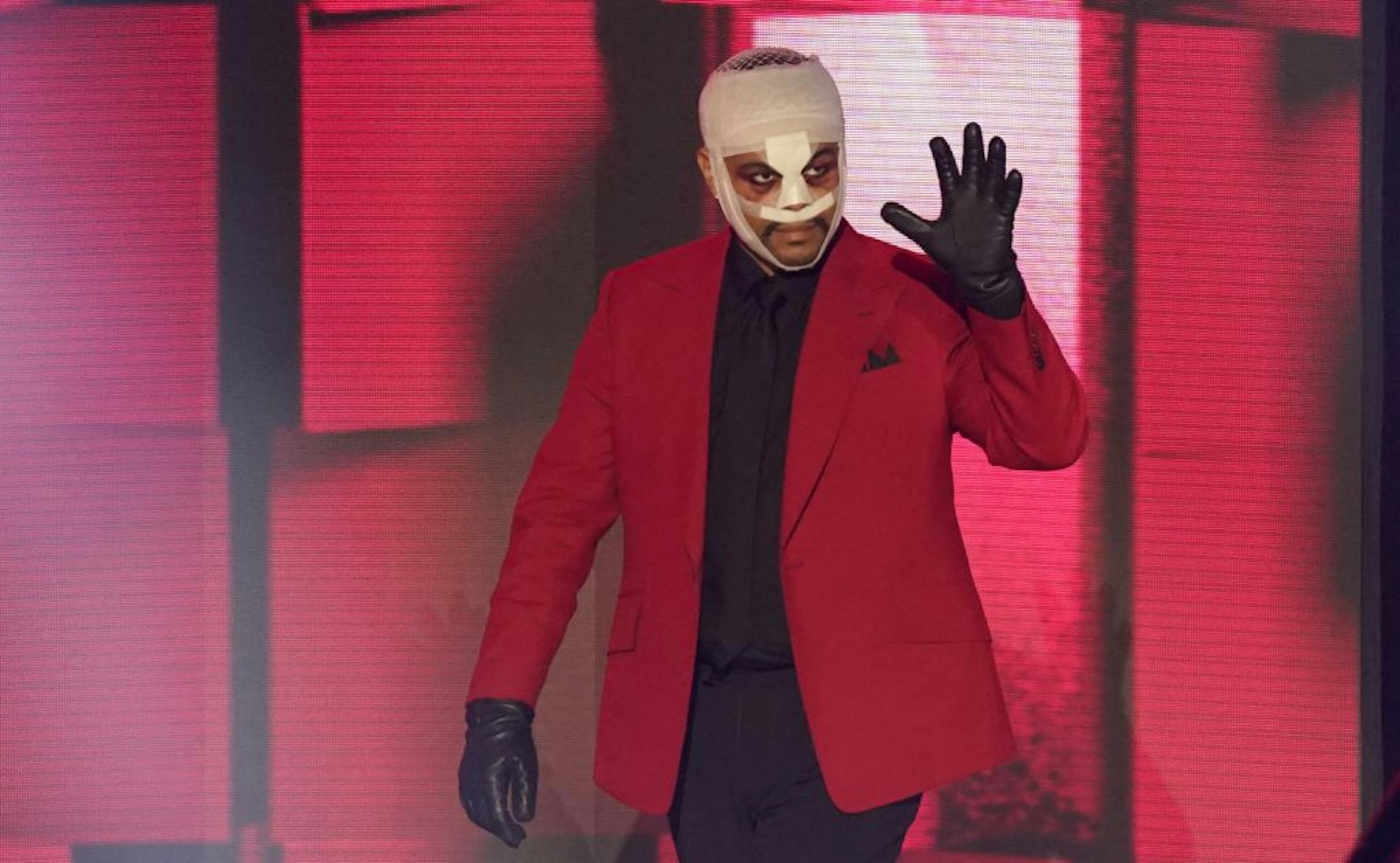 The Weeknd appears on stage to accept the award for favorite male soul/R&B artist at the American Music Awards on Sunday, Nov. 22, 2020, at the Microsoft Theater in Los Angeles.