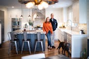 Empty nesters Kellie and Phil Schechinger, pictured with their dog, Marley, recently updated their Edina home to accommodate their casual lifestyle.
