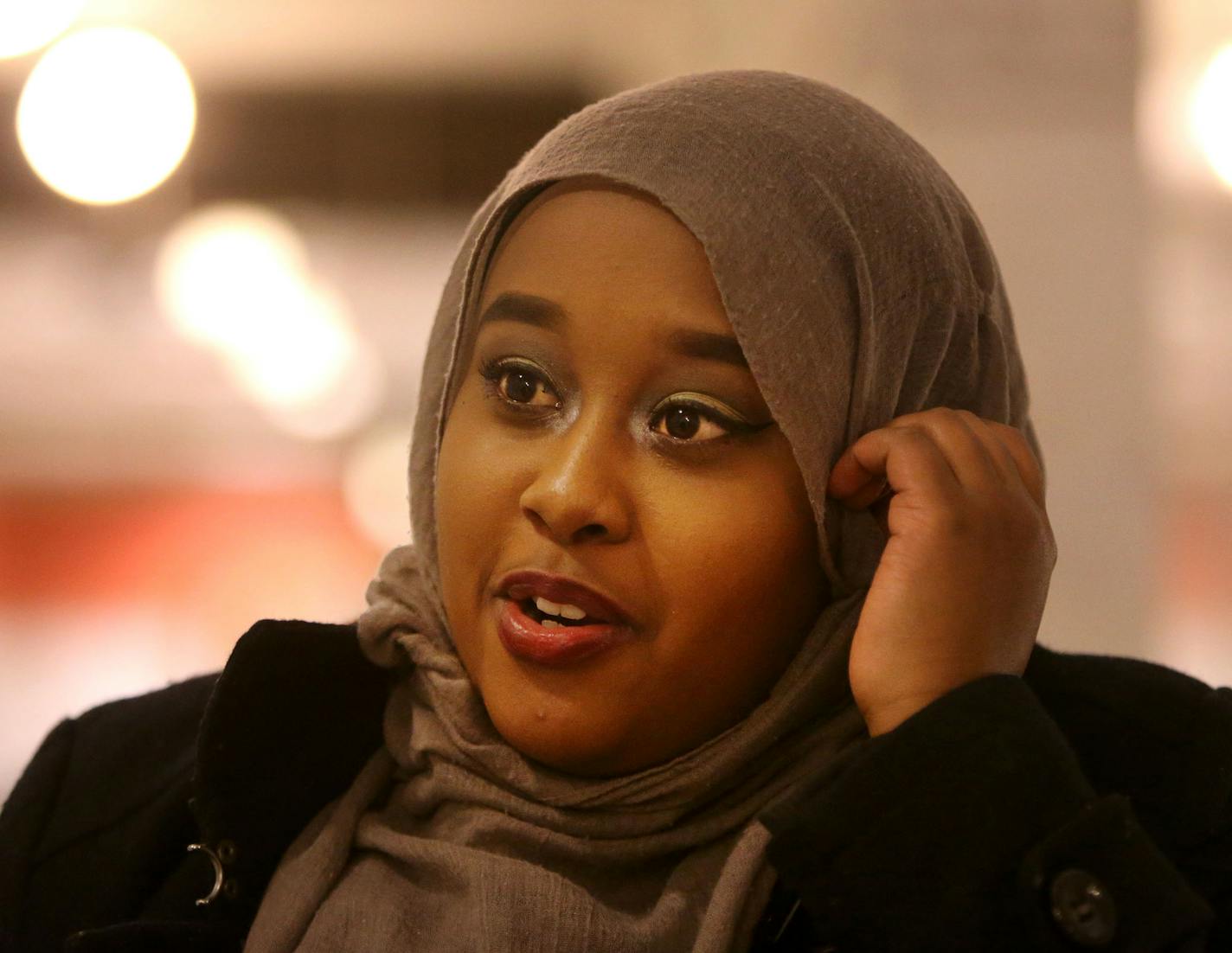 College student Nimo Omar is among the faces of the Black Lives Matter movement in Minneapolis and was seen Tuesday, Dec. 1, 2015, at City Hall in Minneapolis, MN. Omar must juggle homework as a student as well as her committment to BLM. Sometimes, she says she and other students who are a part of the BLM movement at the 4th precinct end up sitting in the darkness of one of their cars, studying and completing homework on their computers.](DAVID JOLES/STARTRIBUNE)djoles@startribune.com Who are th