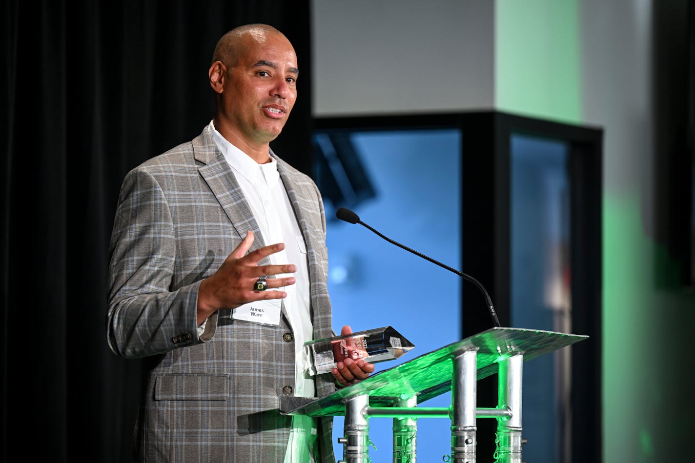 Park Center Boys Basketball Coach James Ware accepts his boys coach of the year award during the Star Tribune's All-Metro Sports Awards gala Wednesday, July 27, 2022 at Allianz Field in St. Paul, Minn.] aaron.lavinsky@startribune.com