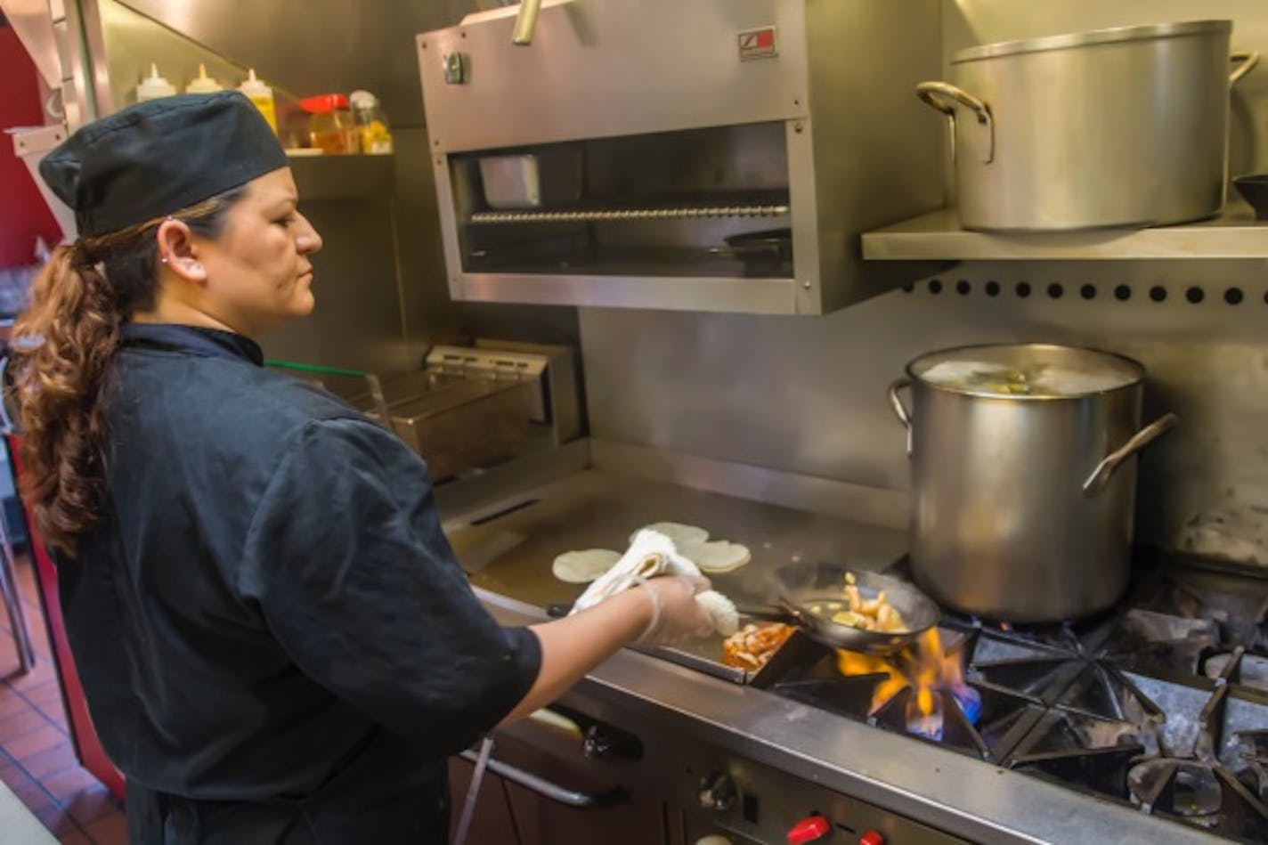 Blanca Laguna prepares her specialty Tacos. (Photography by J. Strowder/JMS)