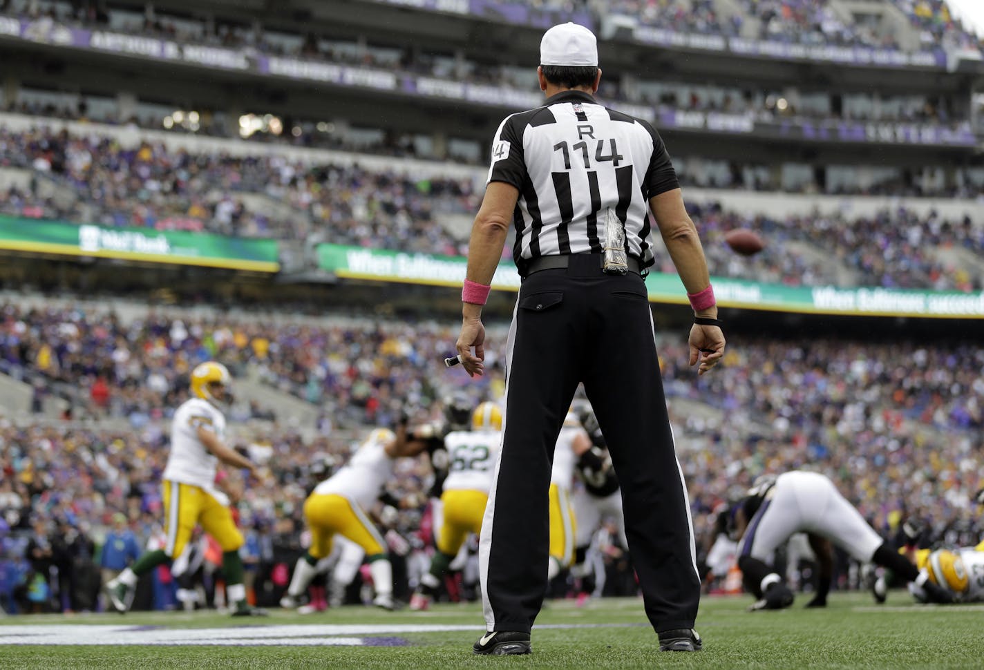 Referee Gene Steratore (114) watches the action during the first half of a NFL football game against between the Baltimore Ravens and the Green Bay Packers in Baltimore, Sunday, Oct. 13, 2013. (AP Photo/Patrick Semansky) ORG XMIT: NYOTK025