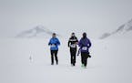 Lisa Richardson of Hastings, left, running the Antarctic Ice Marathon in November 2015, with Sasie Smittipatana of Thailand, center, and Teresa Strad 