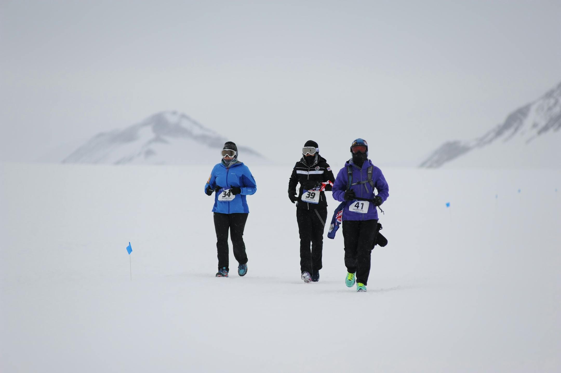Lisa Richardson of Hastings, left, running the Antarctic Ice Marathon in November 2015, with Sasie Smittipatana of Thailand, center, and Teresa Strad of the Cayman Islands, right.