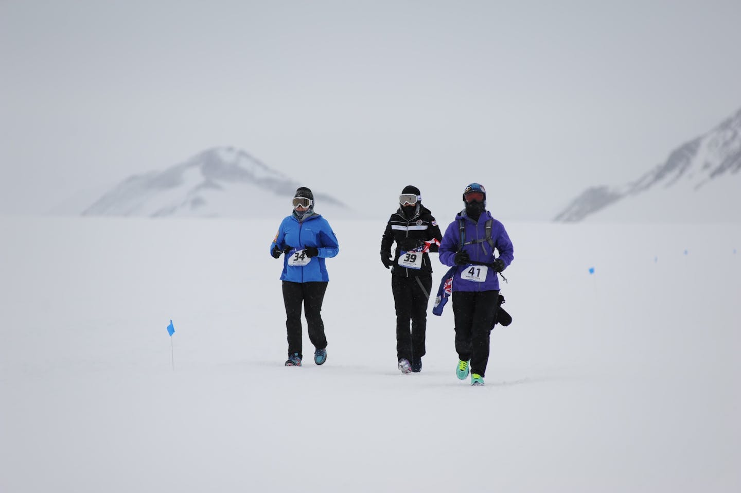 Lisa Richardson of Hastings, left, running the Antarctic Ice Marathon in November 2015, with Sasie Smittipatana of Thailand, center, and Teresa Strad of the Cayman Islands, right.