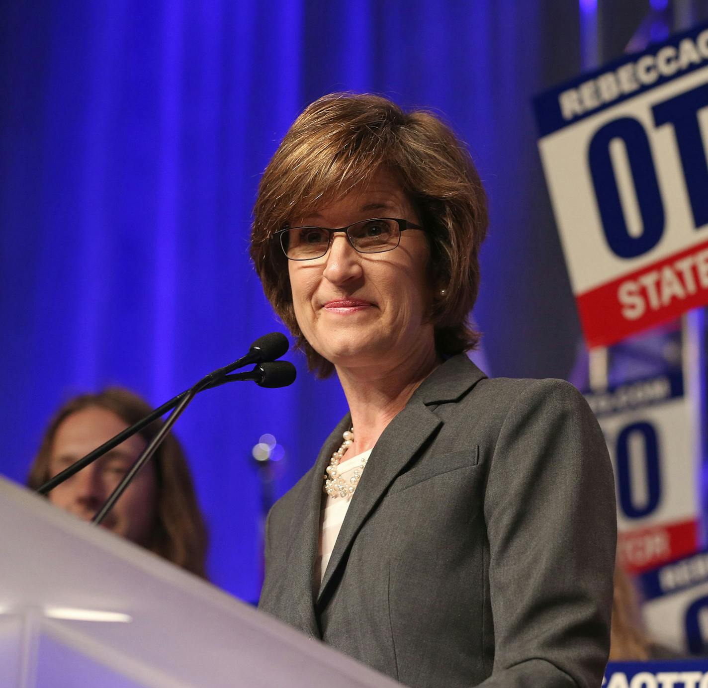 State Auditor Rebecca Otto addresses the Minnesota Democratic-Farmer-Labor Party Convention, Saturday, May 31, 2014 in Duluth, Minn. where she was endorsed by acclimation for the position. (AP Photo/Jim Mone) ORG XMIT: MIN2014053117143872 ORG XMIT: MIN1405311723390085