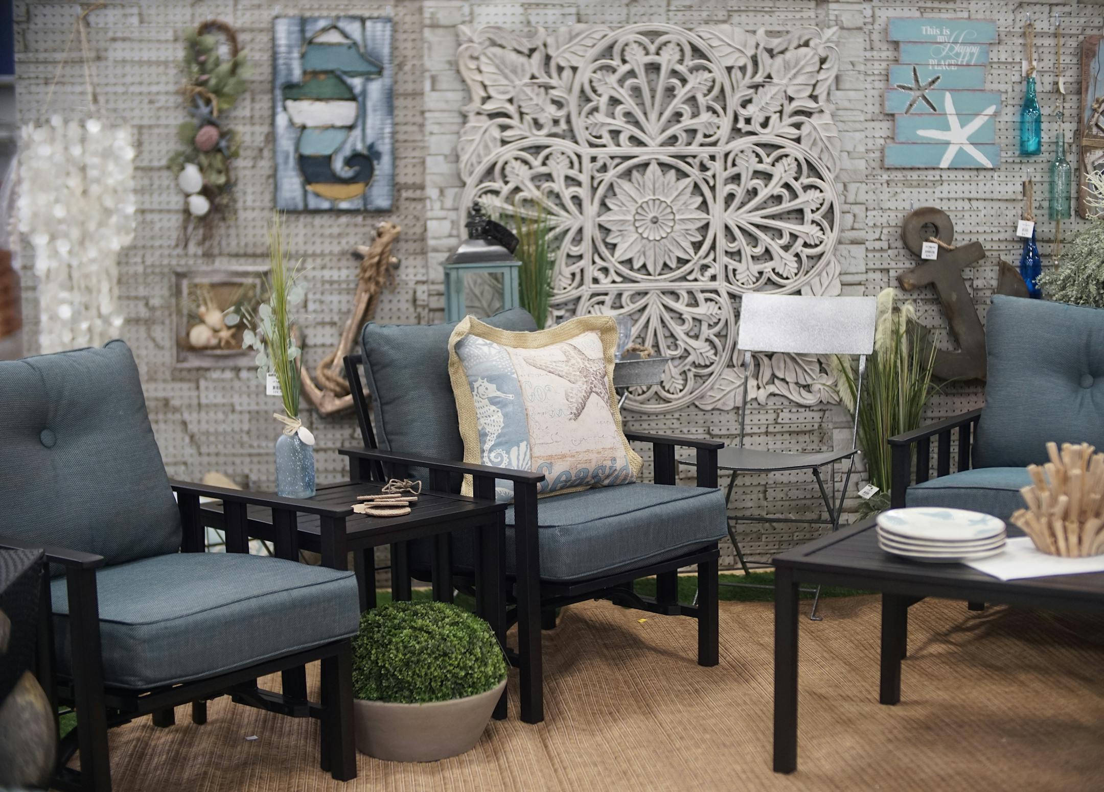 Brenda Fox, store director of of "At Home" has a large selection of patio furniture and cushions.] rtsong-taatarii@startribune.com/ Richard Tsong-Taatarii