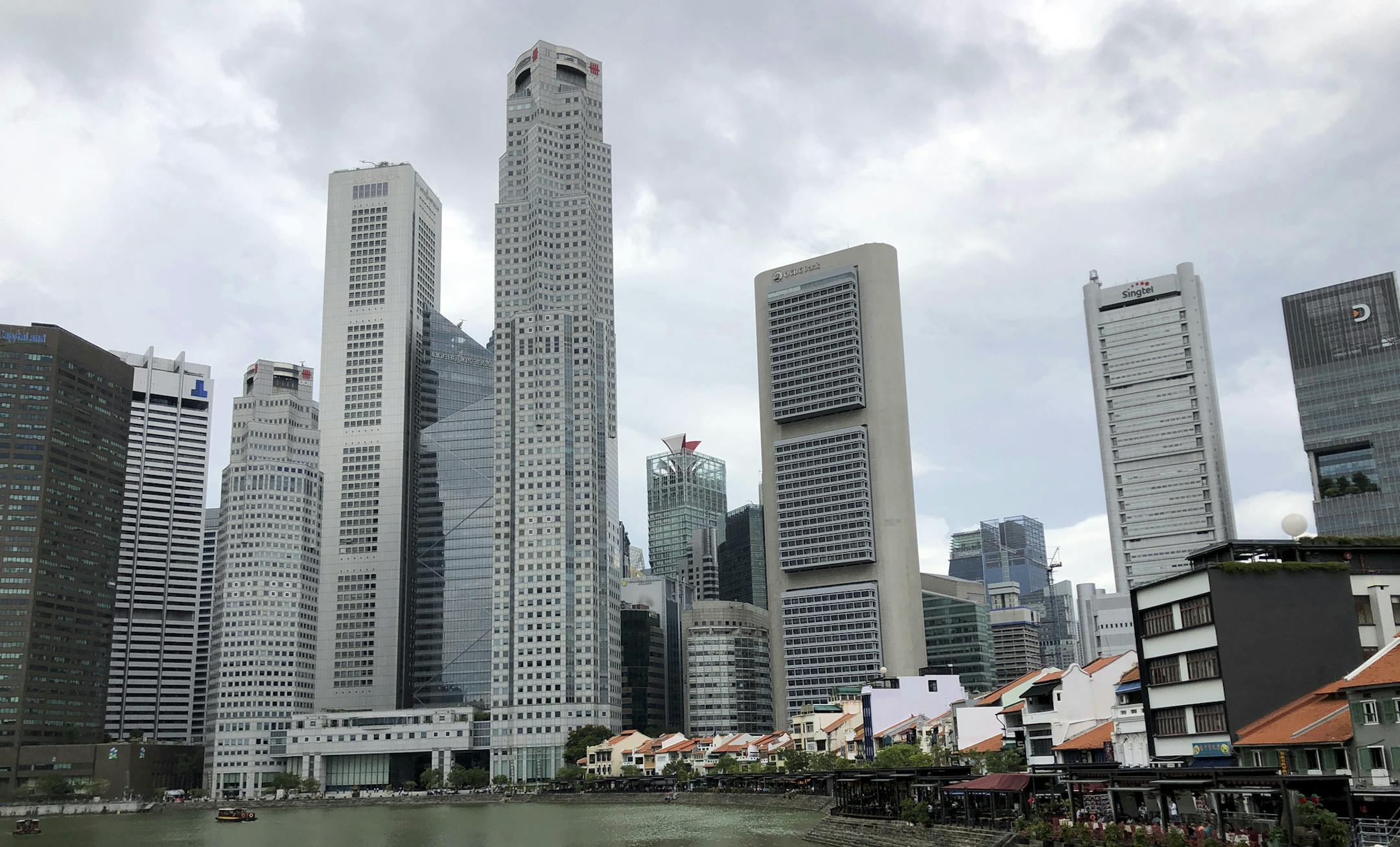 FILE - In this May 10, 2018, file photo, Singapore's financial skyline is seen lining the edge of the Singapore River in Singapore. Weeks from his North Korea summit, President Donald Trump is staring down a dealmakerís worst nightmare: overpromising and under-delivering. (AP Photo/Wong Maye-E, File)