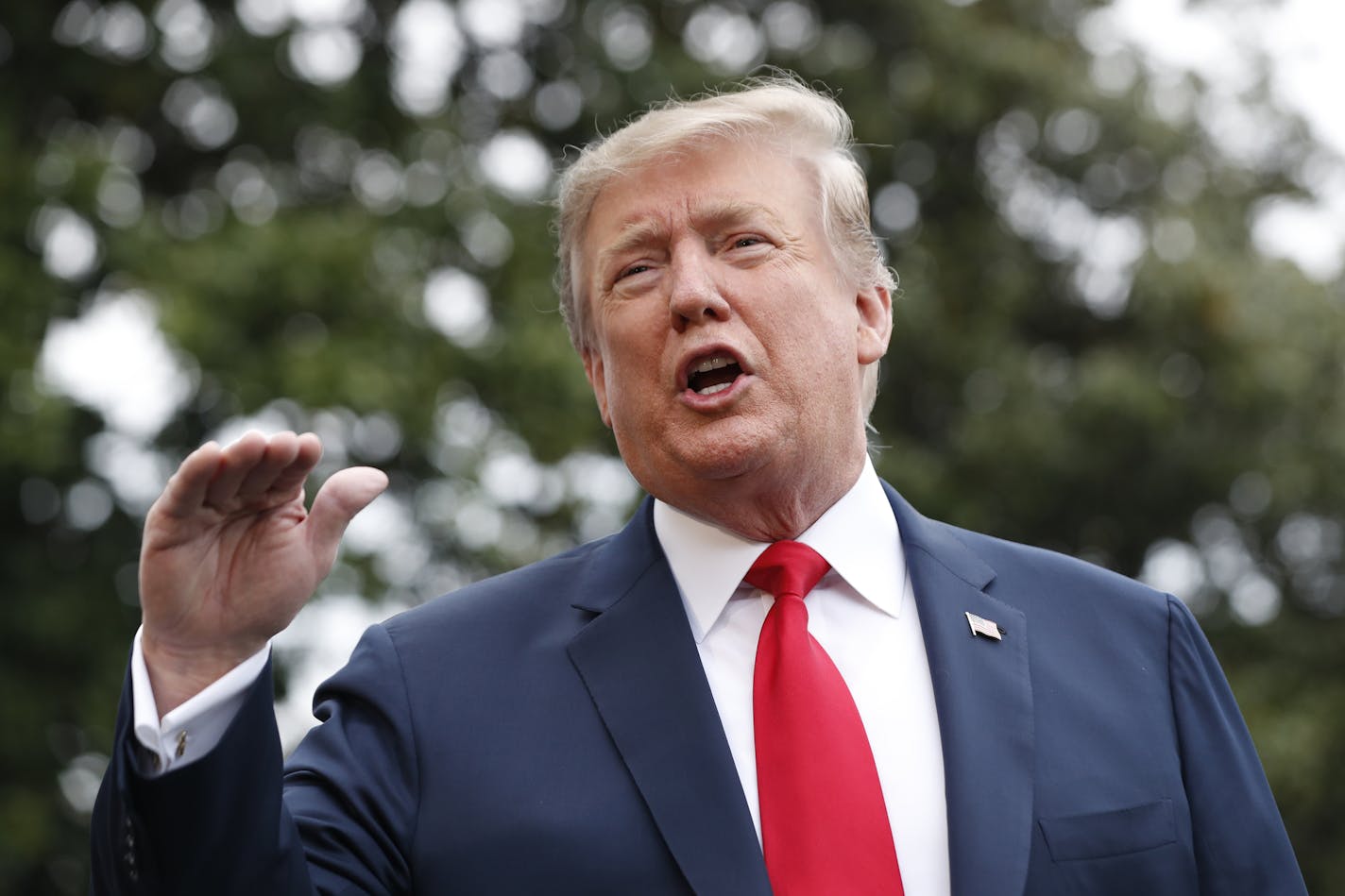 President Donald Trump speaks to the media as he departs the White House, Friday April 26, 2019. (AP Photo/Jacquelyn Martin)