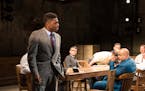 Curtis Bannister (left) tries to sway his fellow jurors in Theater Latté Da’s “Twelve Angry Men.”