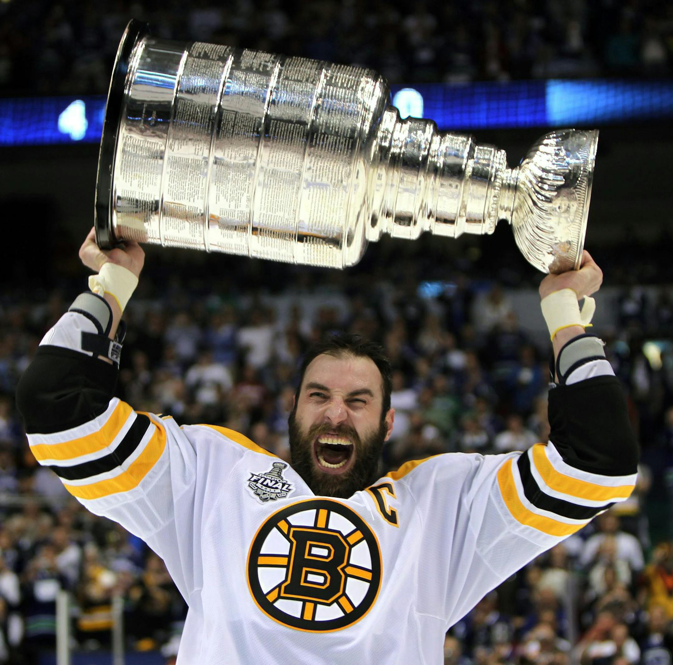 The Bruins' Zdeno Chara hoisted the Stanley Cup following Boston's 4-0 victory over the Vancouver Canucks in Game 7 of the 2011 Final.