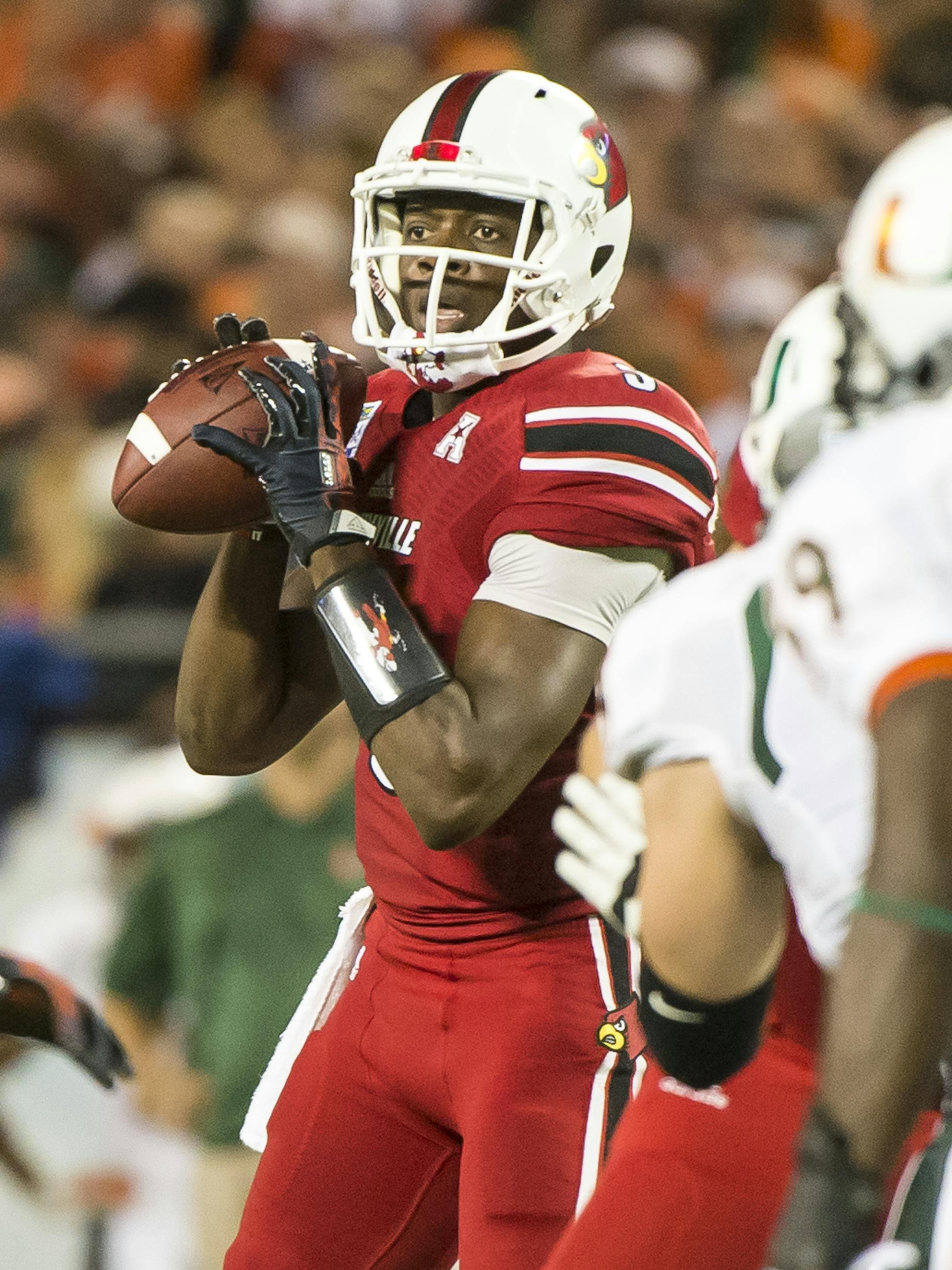 December 28, 2013 - Orlando, FL, U.S: Louisville quarterback Teddy Bridgewater (5) during first half action of the Russell Athletic Bowl between the Miami Hurricanes and the Louisville Cardinals at the Citrus Bowl in Orlando, Fl. (Cal Sport Media via AP Images) ORG XMIT: CSMAP