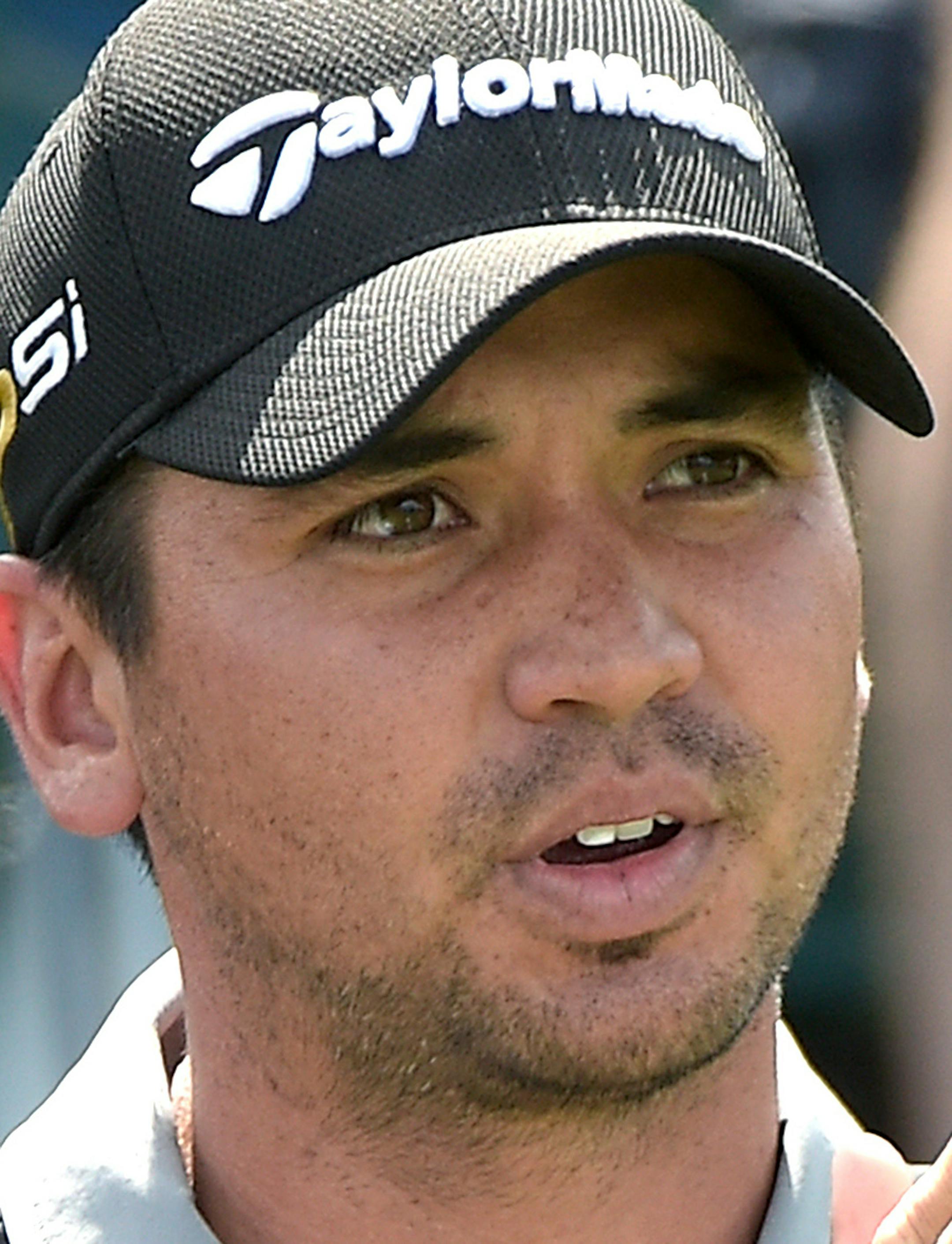 Jason Day, of Australia, reacts after hitting his tee shot on the first hole during a pro-am of the Arnold Palmer Invitational golf tournament in Orlando, Fla., Wednesday, March 16, 2016. (AP Photo/Phelan M. Ebenhack)