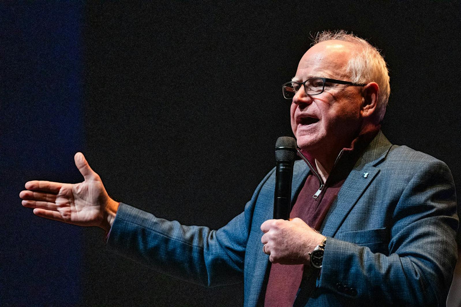 Minnesota Gov. Tim Walz addresses concerns of audience members about the actions of President Donald Trump and Elon Musk in Eau Claire, Wis., on March 18.