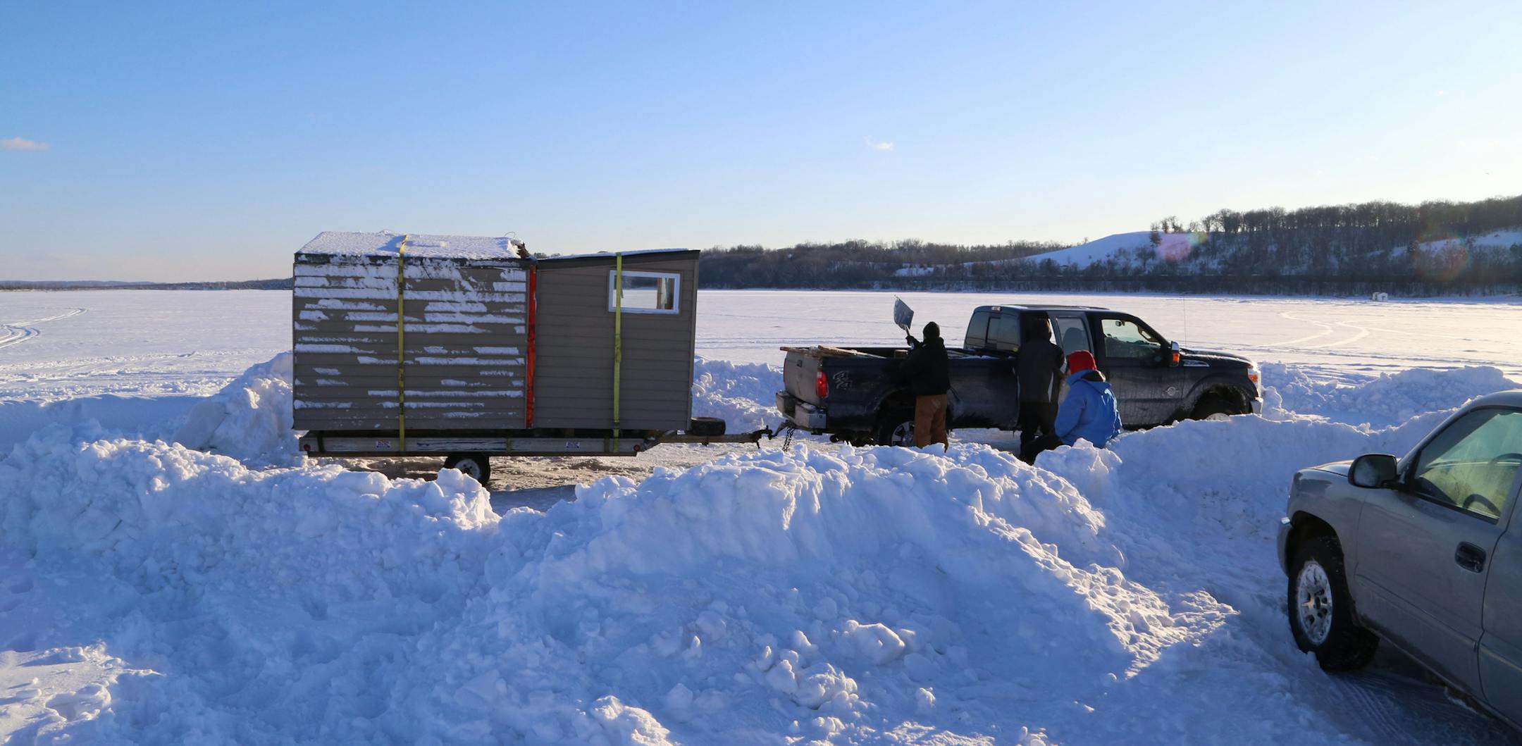 Many fish houses are built on skids that are designed to allow the shanty to be pulled across the ice. But the skids often don't work well in deep snow, requiring trailers for house removal