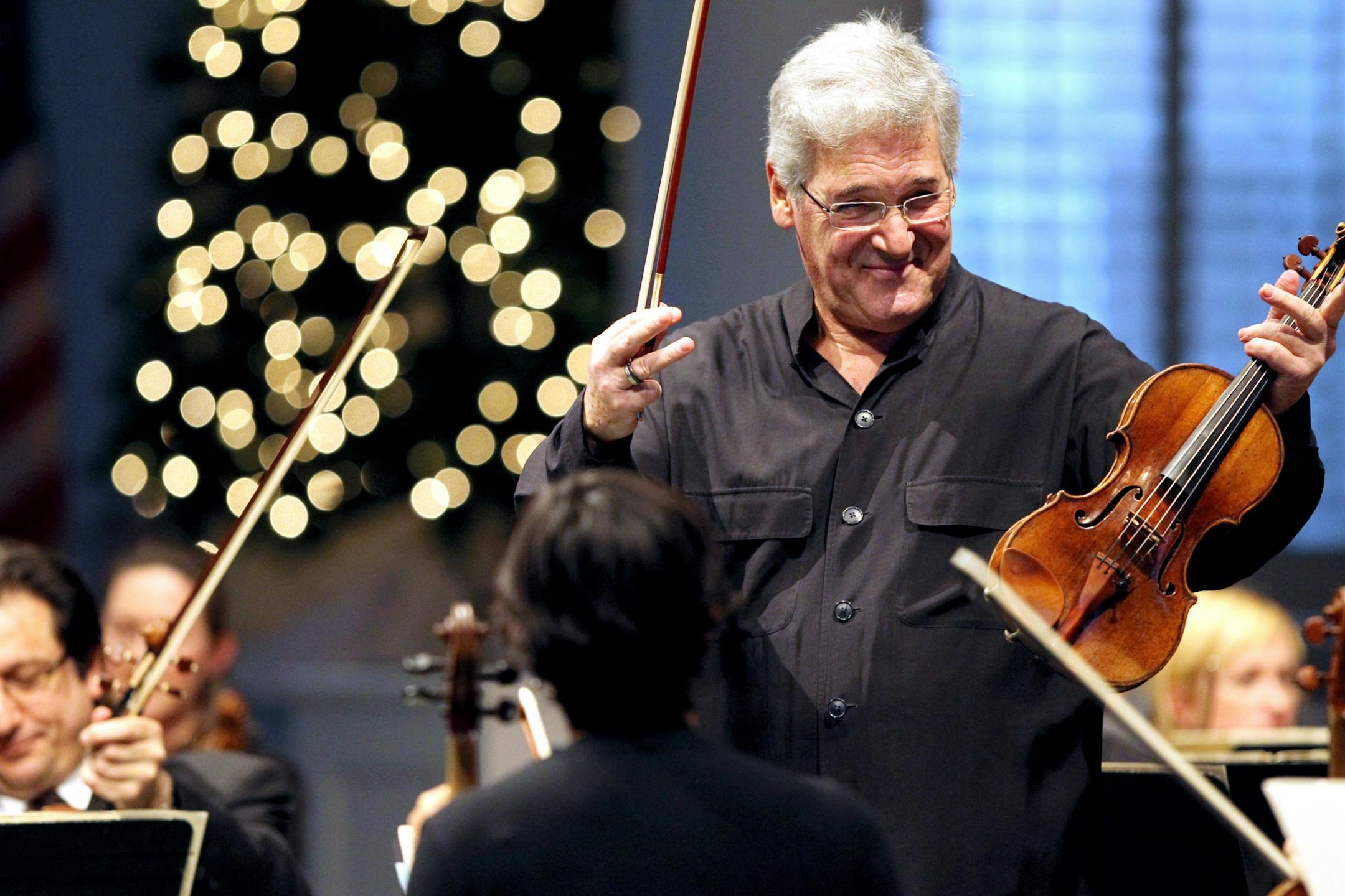 Pinchas Zukerman, internationally acclaimed violin soloist and conductor, played with and led the Saint Paul Chamber Orchestra in an all Mozart program at Wayzata Community Church December 2, 2012. The event was a fundraising concert for the musicians of the SPCO who have been locked out without salary and benefits since October 21st.