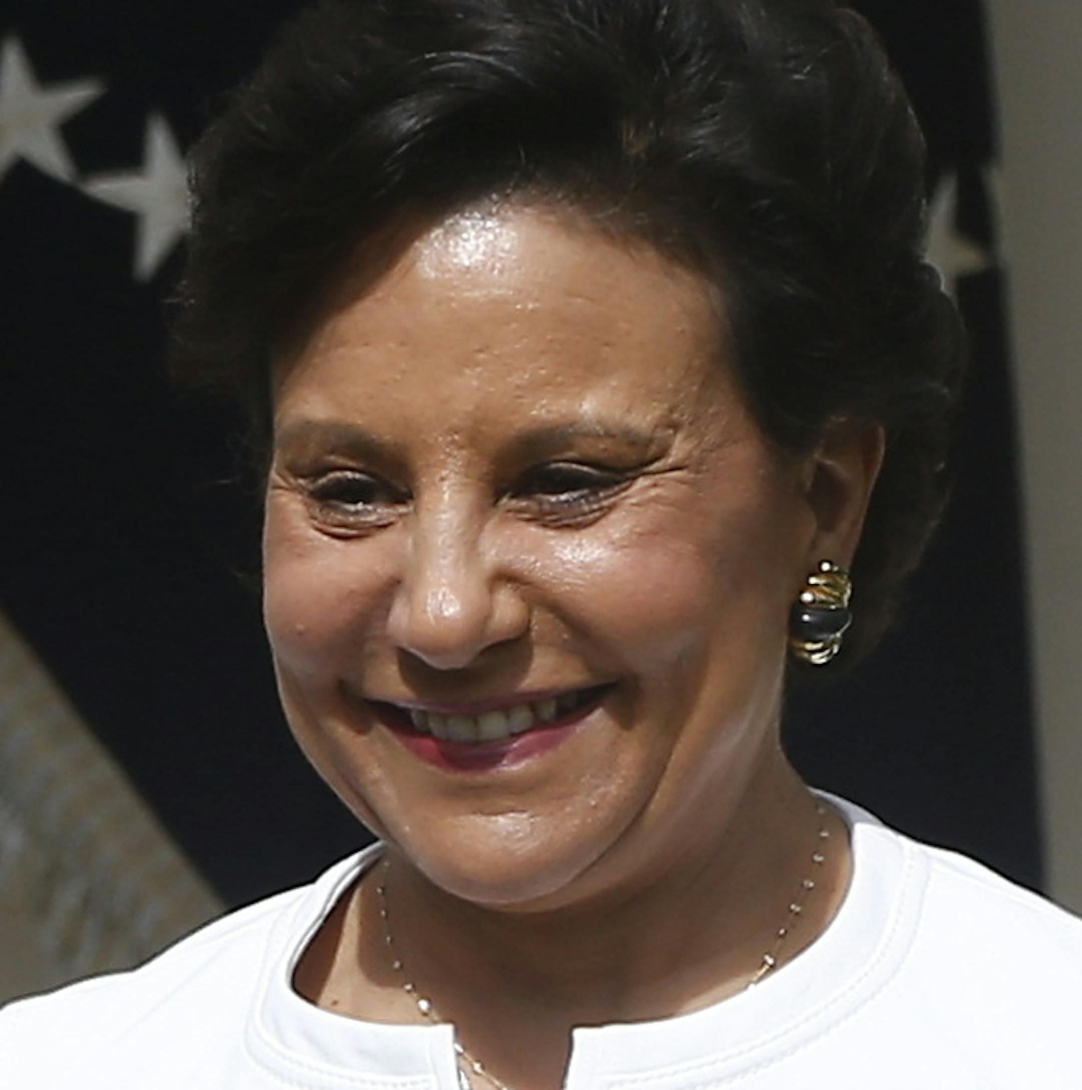 President Barack Obama speaks in the Rose Garden of the White House in Washington as he nominates Penny Pritzker, right, as Secretary of Commerce and Michael Froman as U.S. Trade Representative, in Washington, Thursday, May 2, 2013. (AP Photo/Charles Dharapak) ORG XMIT: MIN2013052017093987