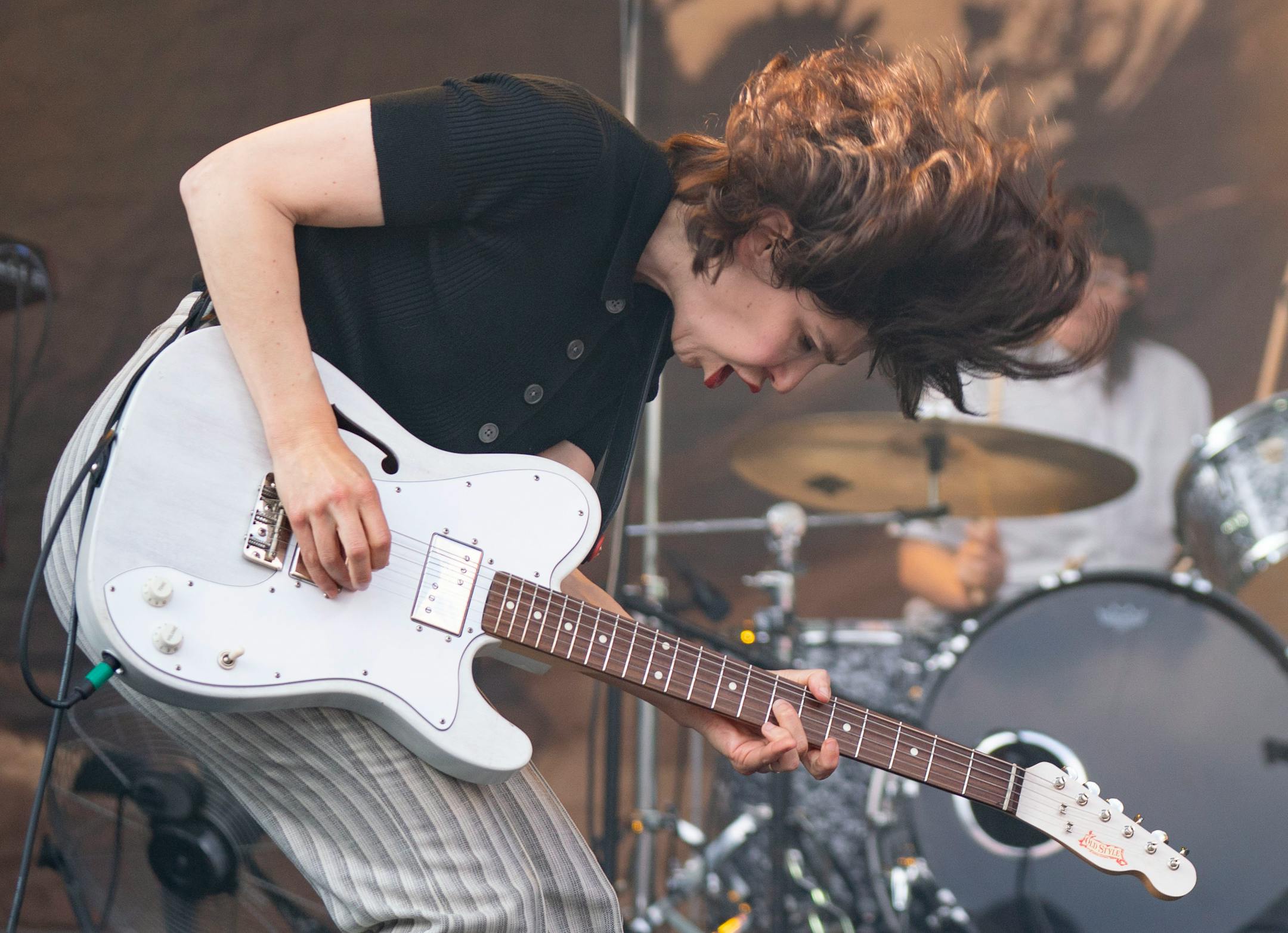 Carrie Brownstein, a guitarist and vocalist in Sleater-Kinney, performs during Rock the Garden.