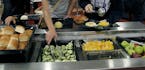 Students were required to place a certain amount of fruits and vegetables on their trays during lunch at Champlin Park High School, in Champlin, MN, T