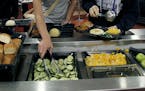 Students were required to place a certain amount of fruits and vegetables on their trays during lunch at Champlin Park High School, in Champlin, MN, T