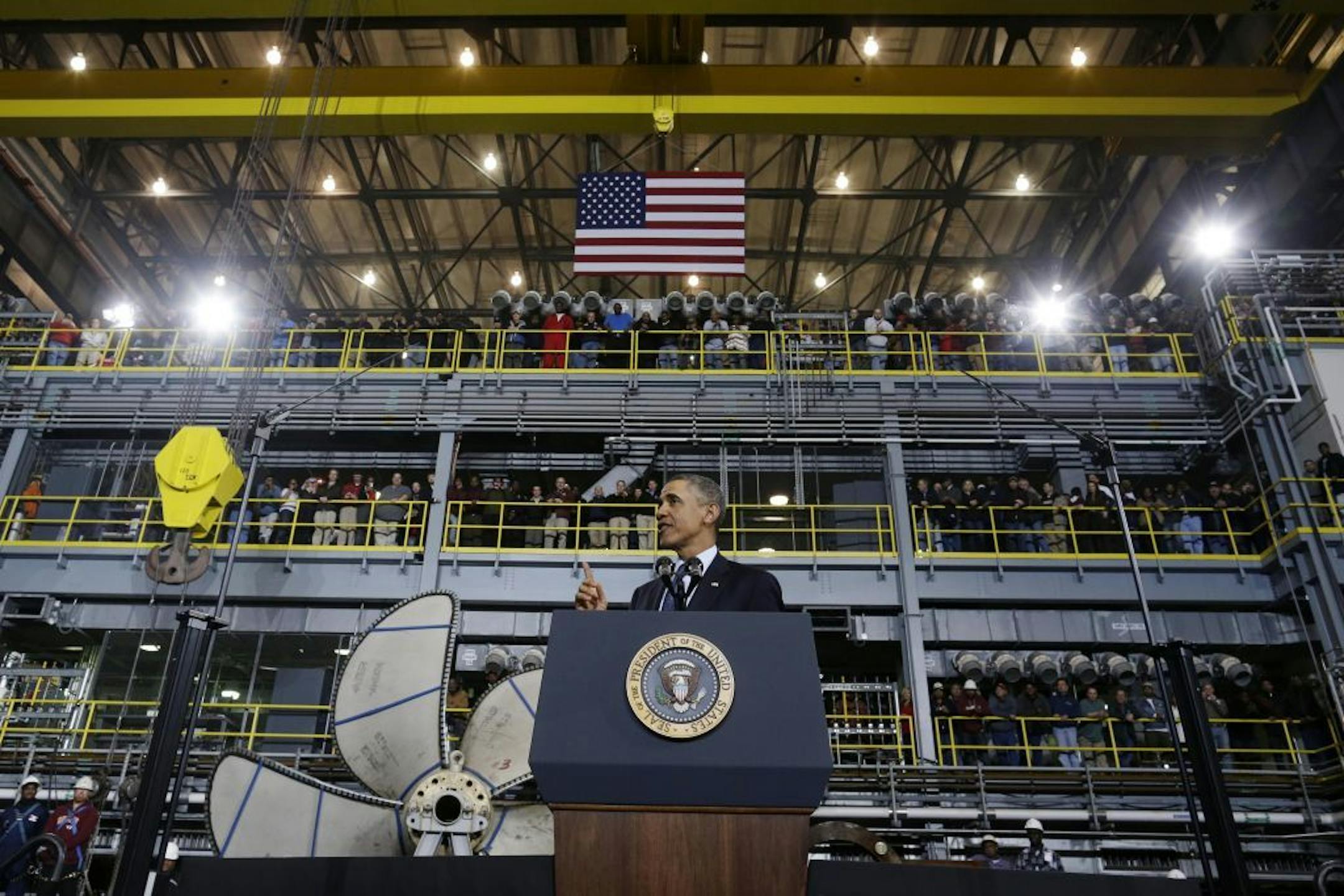 President Barack Obama speaks about automatic defense budget cuts during a visit to Newport News Shipbuilding, a division of Huntington Ingalls Industries, Tuesday, Feb. 26,2013, in Newport News, Va.