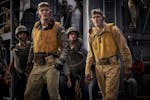 This image released by Lionsgate shows Ed Skrein, left, and Luke Kleintank in a scene from "Midway."