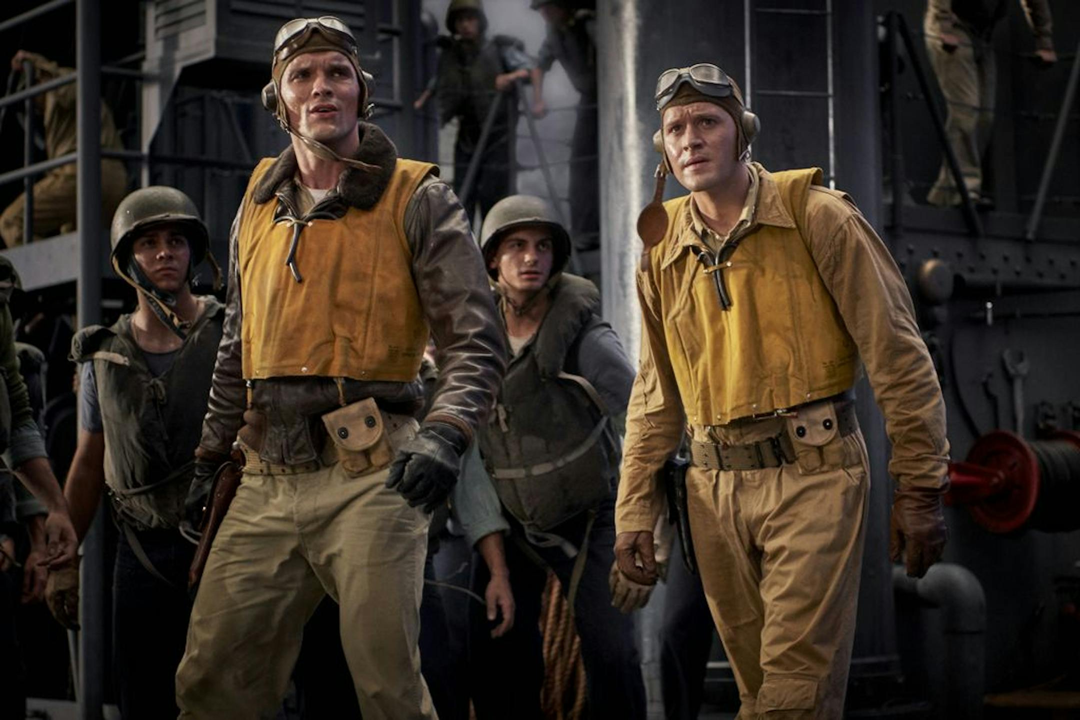 This image released by Lionsgate shows Ed Skrein, left, and Luke Kleintank in a scene from "Midway."