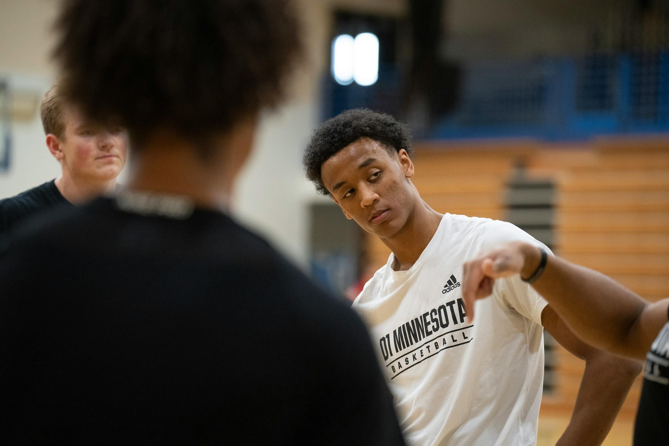 Jonathan Mekonnen listened to head coach Jonathan Willisms during practice at Wayzata Central Middle School in Plymouth.