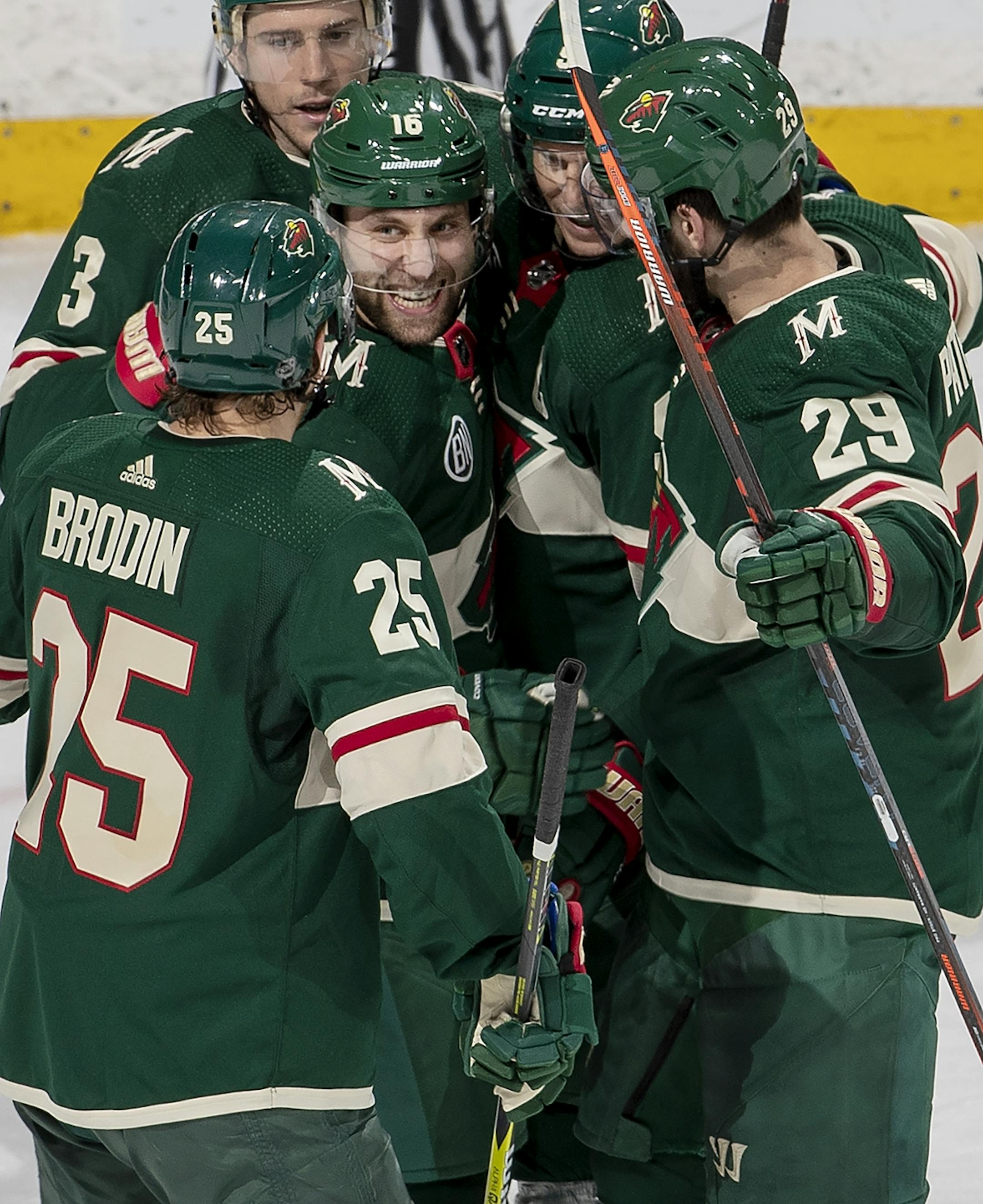 Jason Zucker (16) celebrated with teammates after scoring a power play goal in the second period.