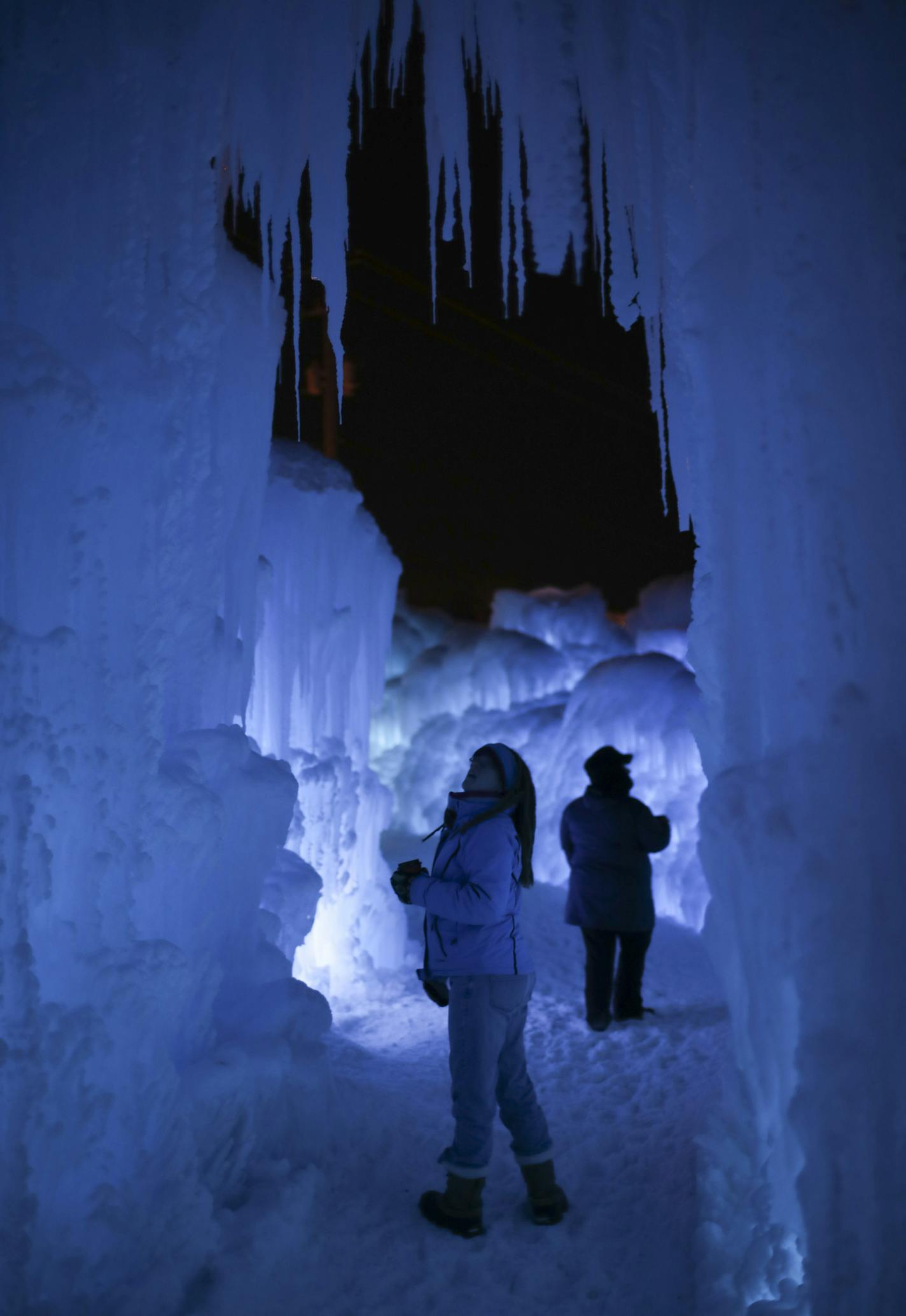 Visitors inside the Ice Castles at the Lift Bridge Sunday night. ] JEFF WHEELER &#xef; jeff.wheeler@startribune.com The town of Stillwater is hosting Ice Castles at the Lift Bridge in Lowell Park from now until as late as March, depending on the weather. The frozen spectacle is open daily afternoons and evenings, except Tuesdays.