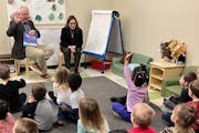 Gov. Tim Walz and Lt. Gov. Peggy Flanagan read to a classroom of children at Tutor Time in Brooklyn Park on Monday, Jan. 22, before announcing a progr
