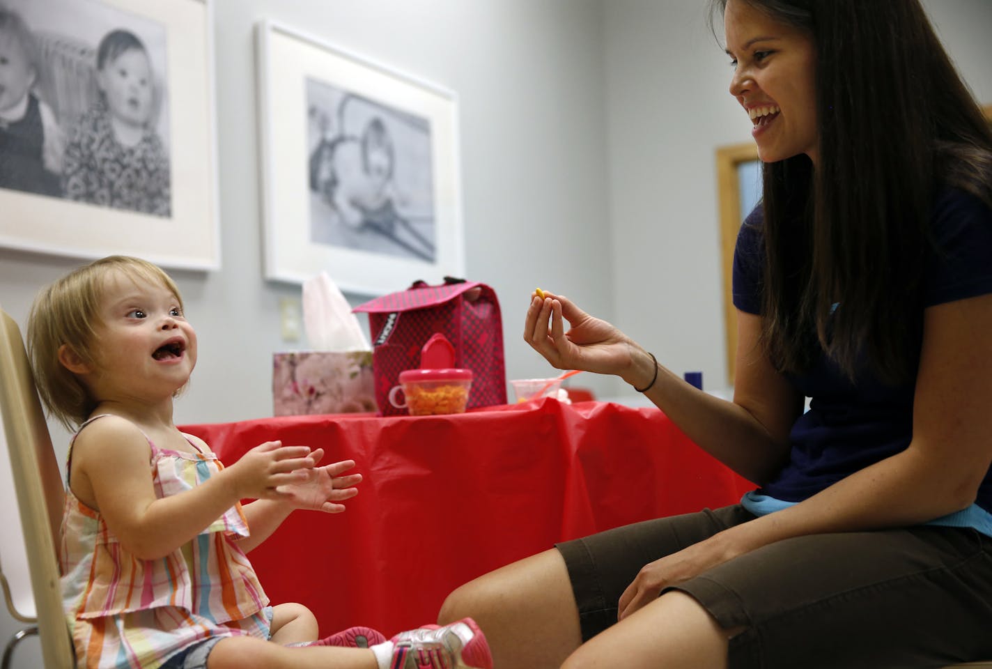 GiGi's Playhouse is a support network, play group, and educational facility for children with Down syndrome in St. Louis Park. Brooke, 2, and her mother Tawnya Dilly enjoyed some goldfish snacks. They come at least once a week to the open play time from Victoria.]tsong-taataarii@startribune.com