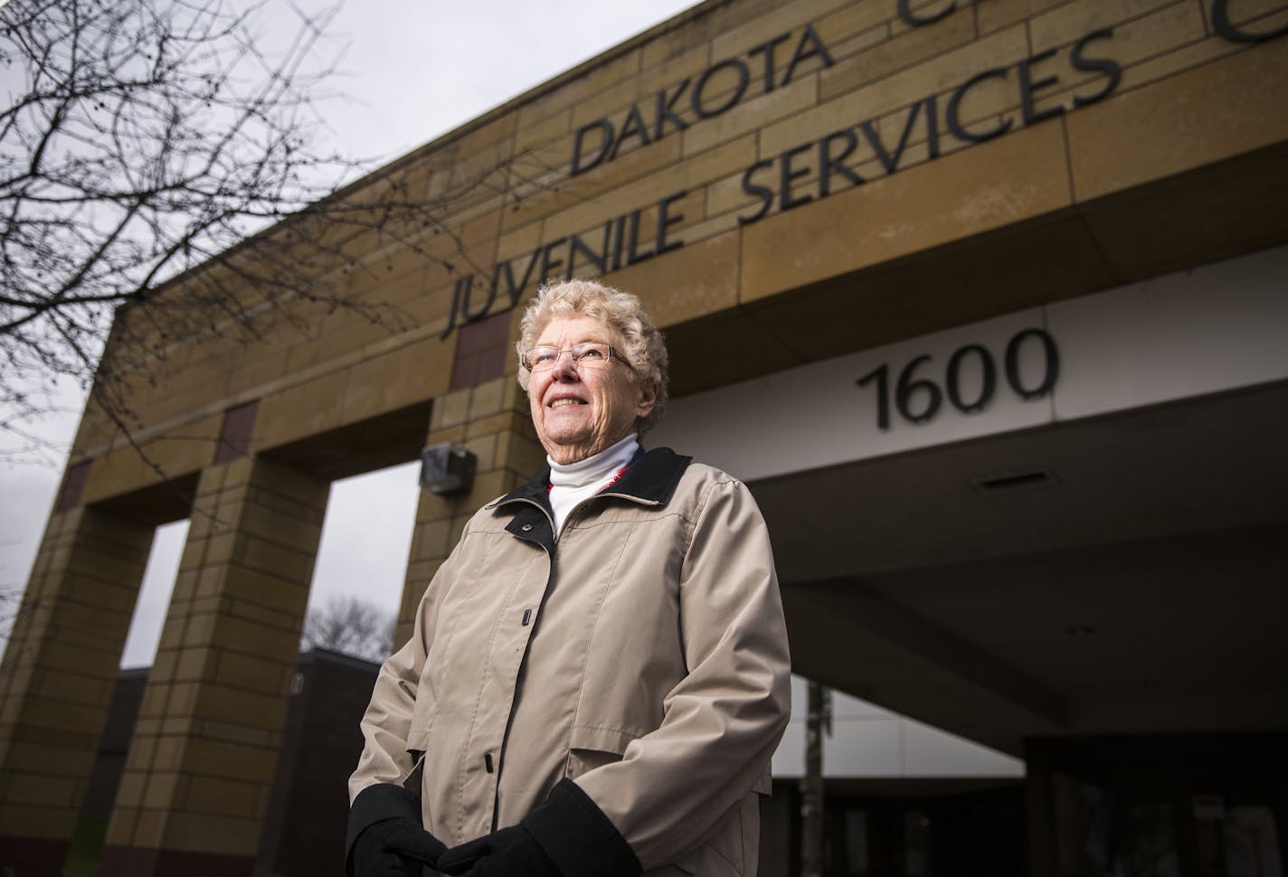 Mary Monahan poses outside the Dakota County Juvenile Services Center in Hastings on Wednesday, December 16, 2015. ] (Leila Navidi/Star Tribune) leila.navidi@startribune.com BACKGROUND INFORMATION: Mary Monahan, or "Grandma Mary," has spent the last 15 years volunteering at the Dakota County Juvenile Services Center as the grandmother some young offenders never had.