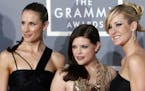 FILE - In this Feb. 11, 2007, file photo, the Dixie Chicks, Emily Robison, left, Natalie Maines, center, and Martie Maguire, who earned five Grammy no