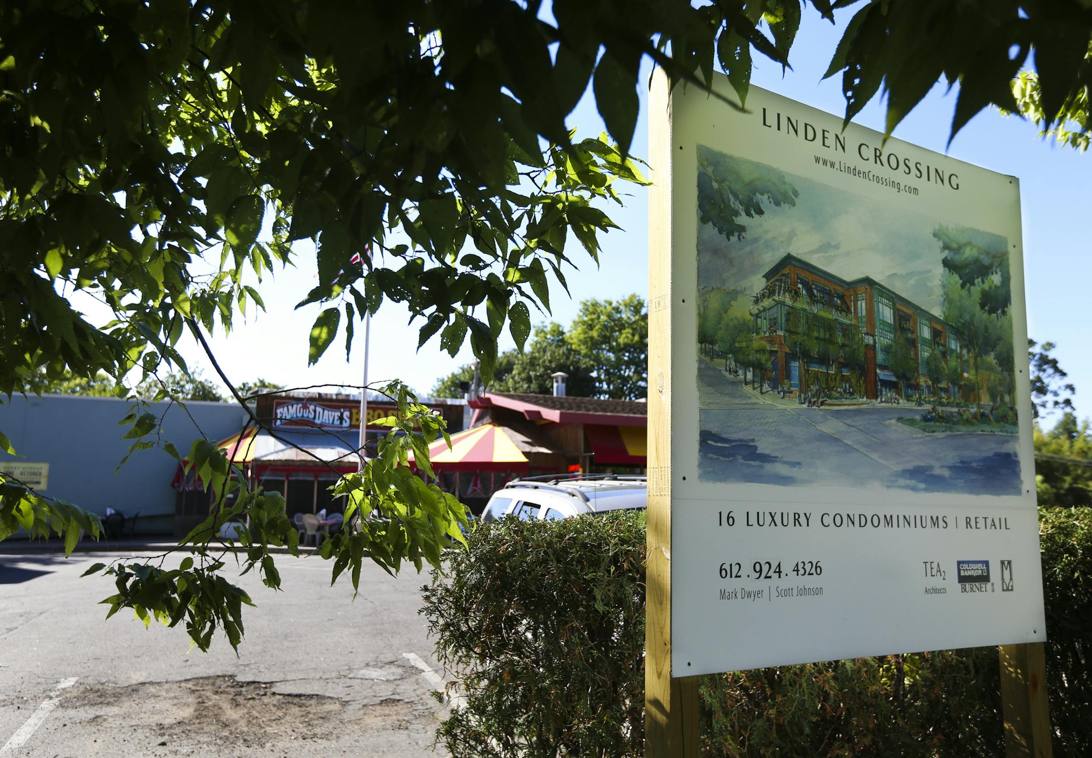 A drawing of the planned condominiums sits in front of Famous Dave's at 43rd and Upton Avenue in Minneapolis, Minn., on Wednesday, September 10, 2013. ] (RENEE JONES SCHNEIDER • reneejones@startribune.com)