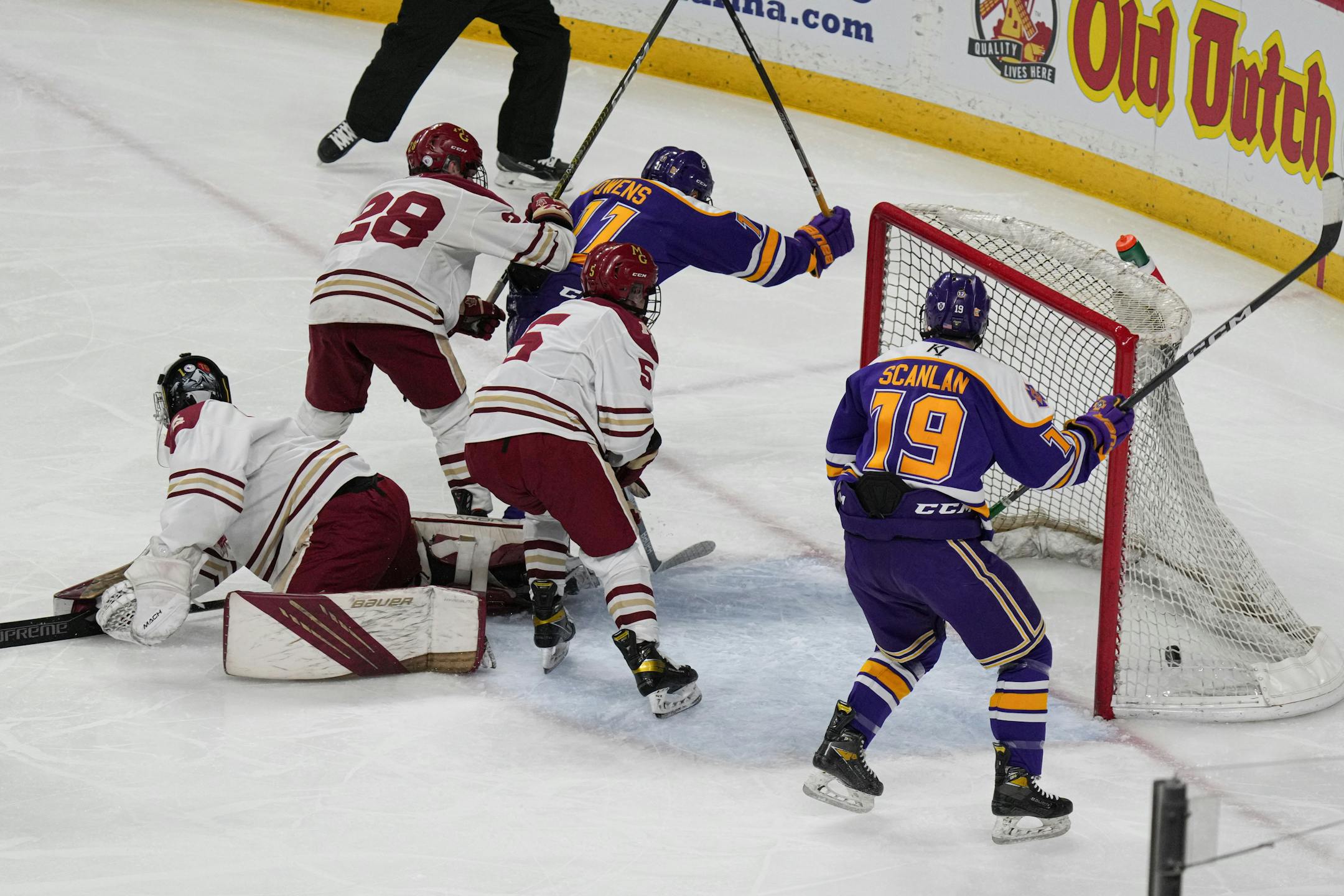 Cretin-Derham Hall forward Charles Owens (11) scores the first goal of the game against Maple Grove in the first period.