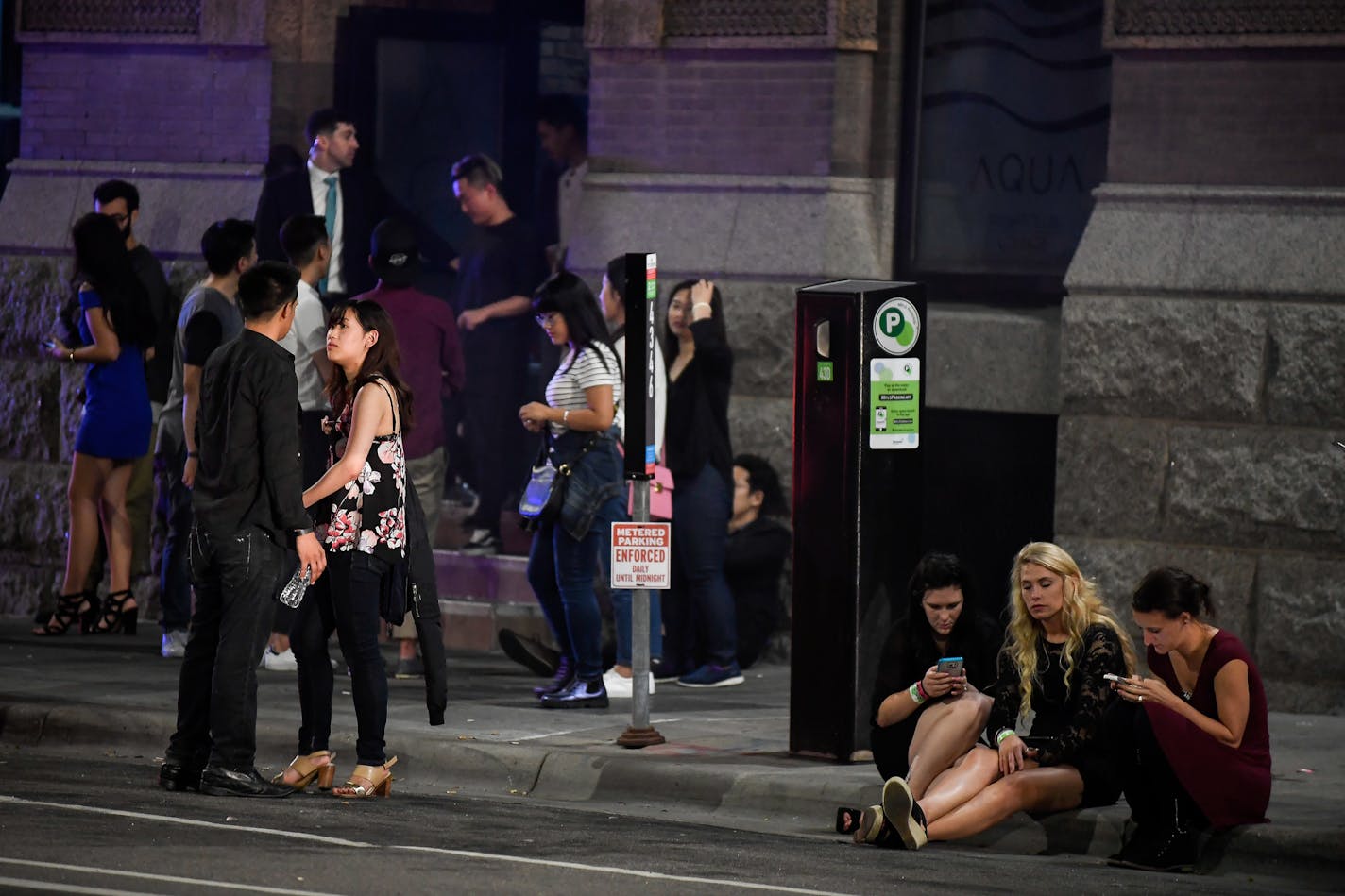 The sidewalk outside Aqua Nightclub and Lounge was filled with patrons just before closing time early Sunday morning. ] AARON LAVINSKY &#xef; aaron.lavinsky@startribune.com The issue of downtown crime issue will likely spill into the mayoral race in Minneapolis. Will Betsy Hodges' downtown safety plan improve quality of life on Hennepin Avenue? Or can Tom Hoch, longtime theater district and downtown leader, make it into a campaign issue? Even if statistics show that downtown crime is more percep