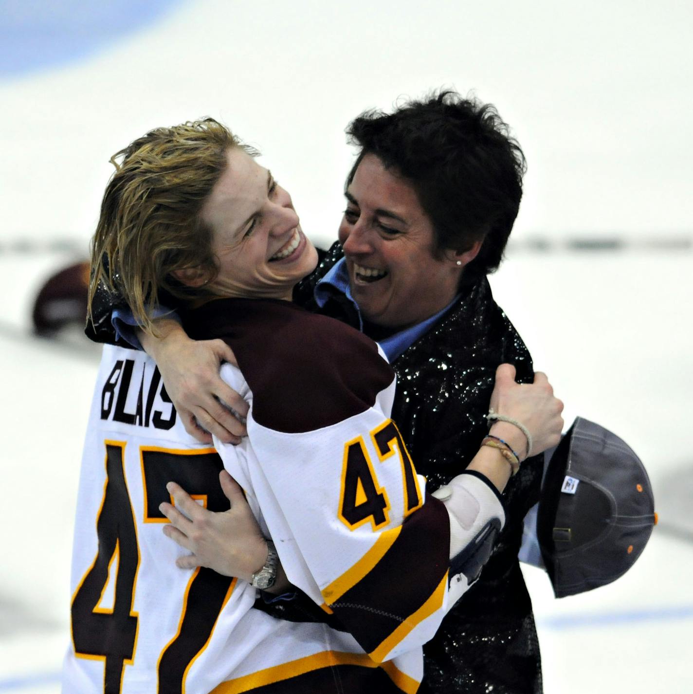 Minnesota-Duluth's Emmanuelle Blais celebrates with head coach Shannon Miller after defeating Cornell 3-2 after the third overtime at the NCAA Women's Frozen Four championship hockey game Sunday, March 21, 2010, at Ridder Arena in Minneapolis. Minnesota-Duluth defeated Cornell 3-2. (AP Photo/Dawn Villella) ORG XMIT: MNDV105 ORG XMIT: MIN1402061734280579