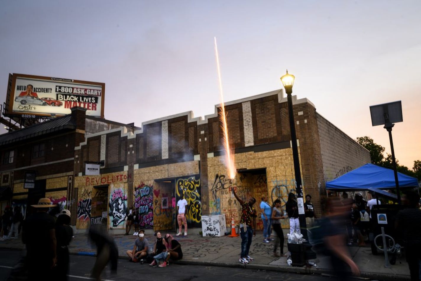 A man shot off fireworks along Chicago Avenue Saturday night near Cup Foods.