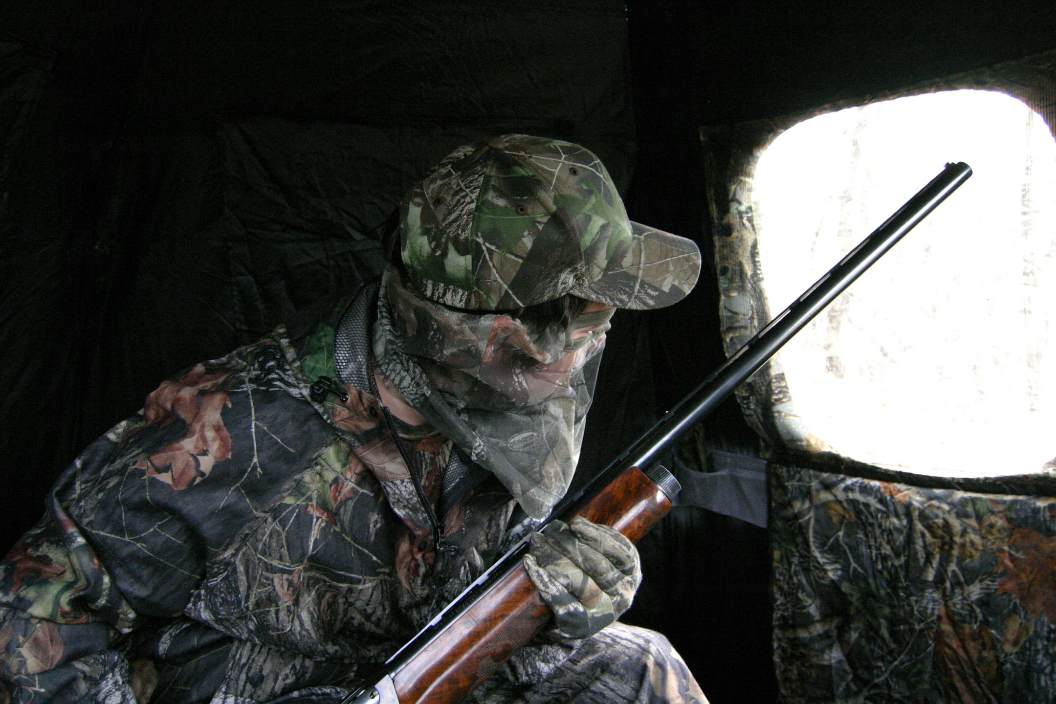 A turkey hunter watches spring unfold while hunkered inside a hunting blind. This spring Minnesota hunters are harvesting birds at a record pace, but many hunters still will go home without a bird.