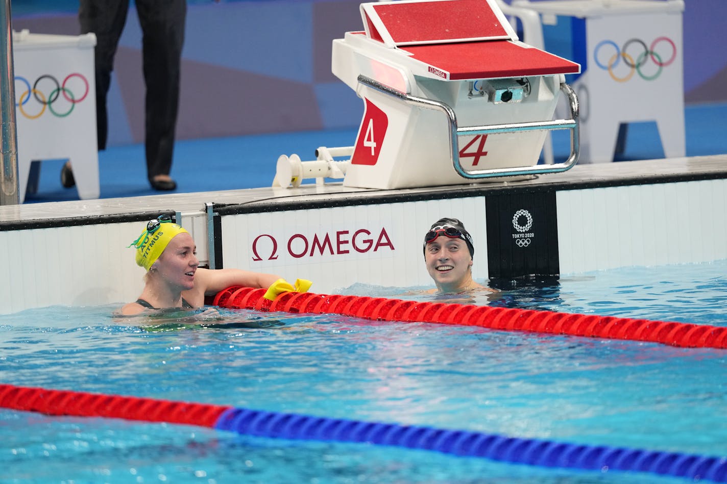 Ariarne Titmus of Australia, left, and Katie Ledecky after the women's in the 400-meter freestyle final in Tokyo, on July 26, 2021, at the postponed 2020 Tokyo Olympics. She won gold in the event. Titmus earned the gold medal and Ledecky finished with the silver medal. (Doug Mills/The New York Times)