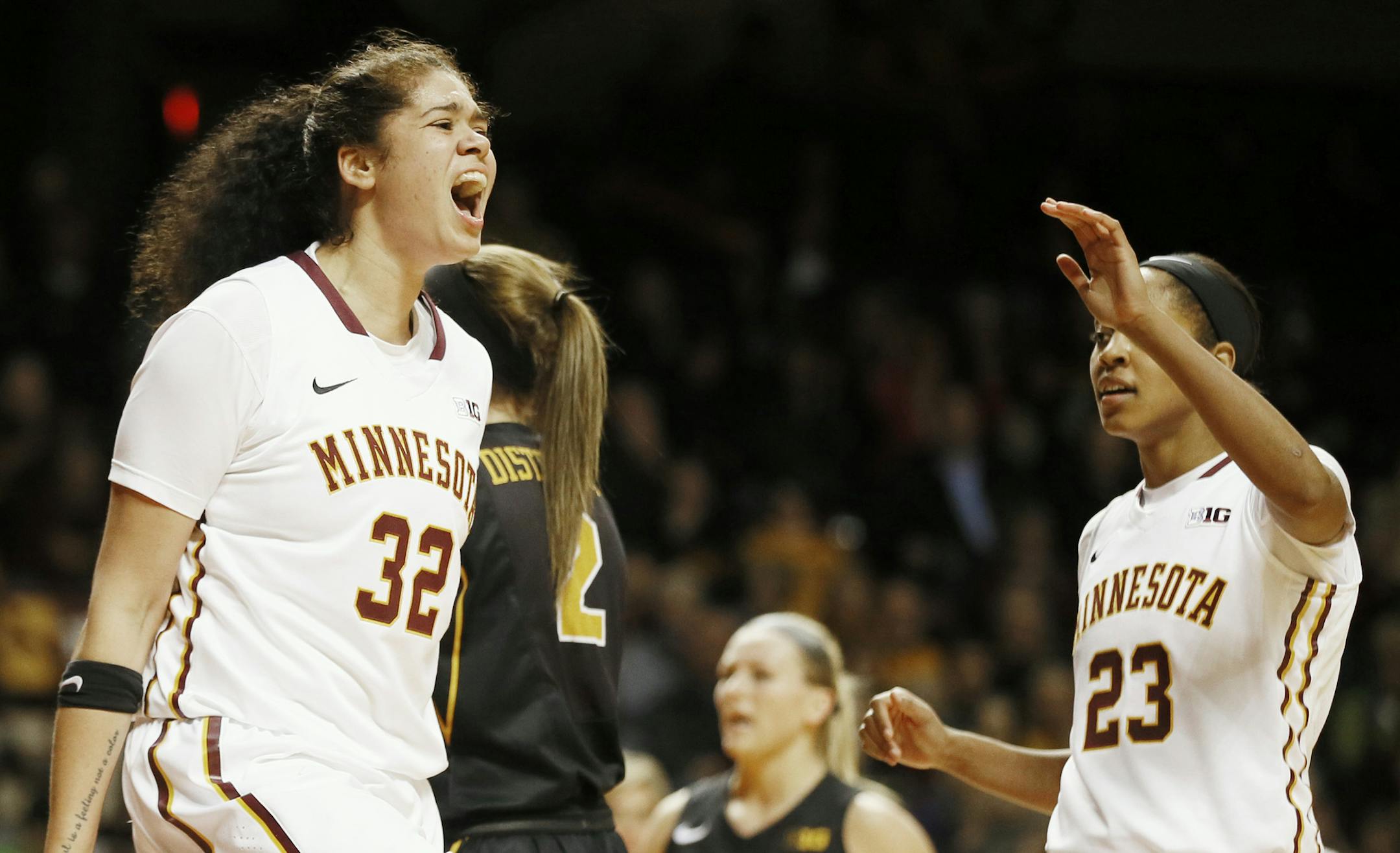 Minnesota Golden Gophers center Amanda Zahui B. (32) celebrated with teammate Shae Kelley (23) after scoring in the second half. Minnesota beat Iowa 93-80 at Williams Arena Tuesday February 17, 2015 in Minneapolis MN. ] Jerry Holt/ Jerry.Holt@Startribune.com ORG XMIT: MIN1502172207141124 ORG XMIT: MIN1503032012210641