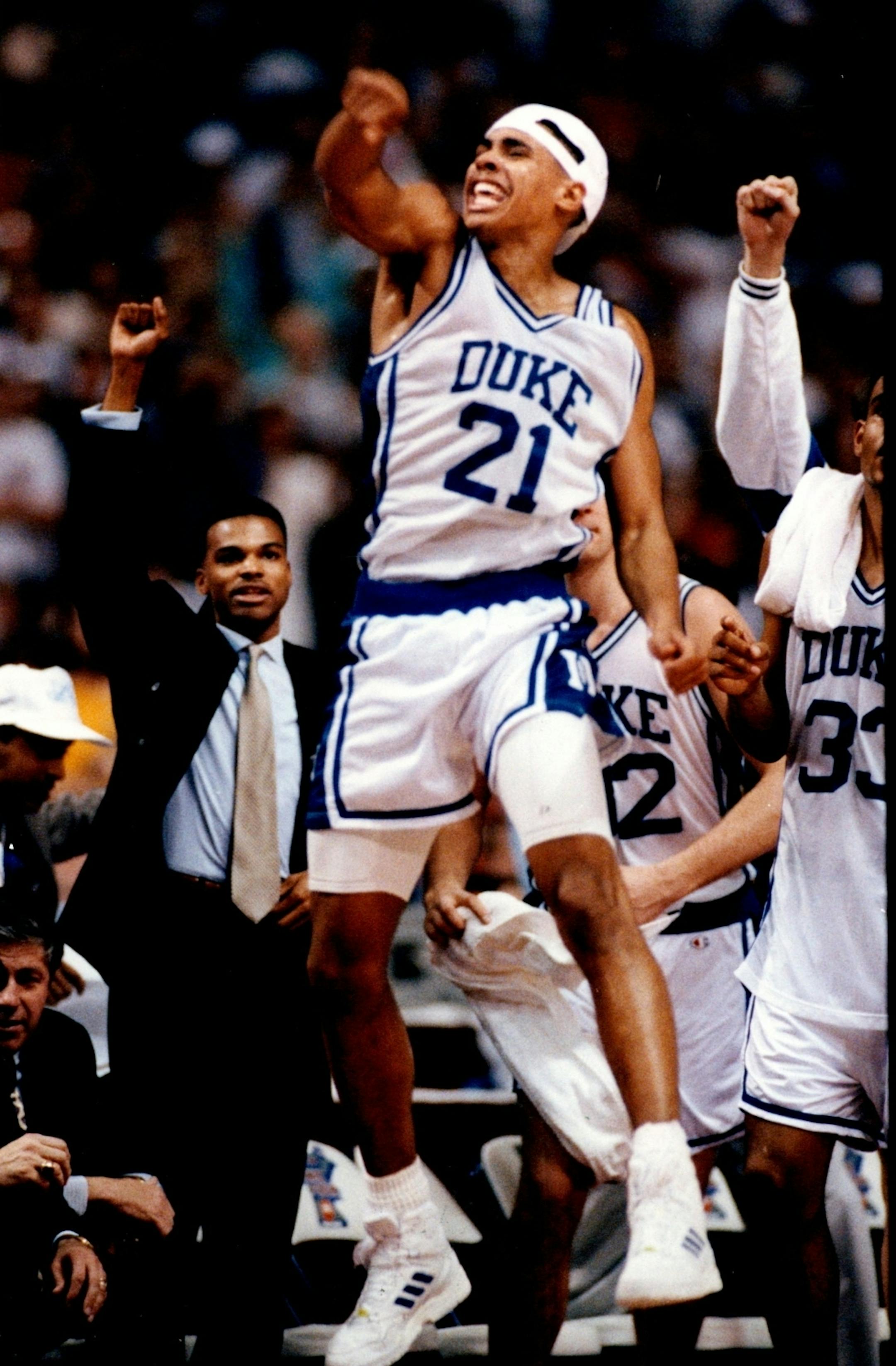 Antonio Lang leaped high in celebration at the conclusion of Duke's NCAA title-clinching victory over Michigan in the 1992 Final Four. (Brian Peterson/Star Tribune)